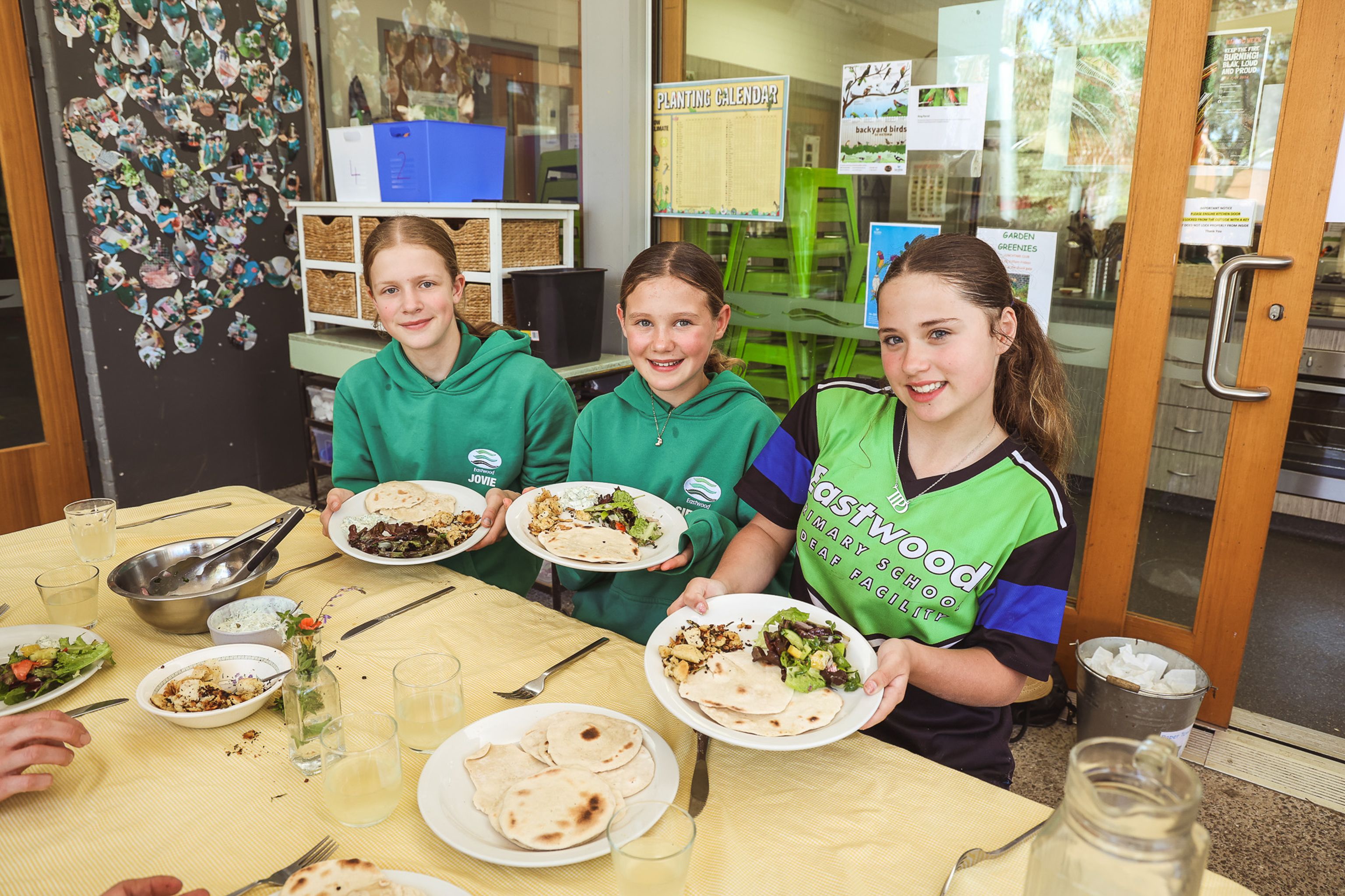 School students with their plate of food