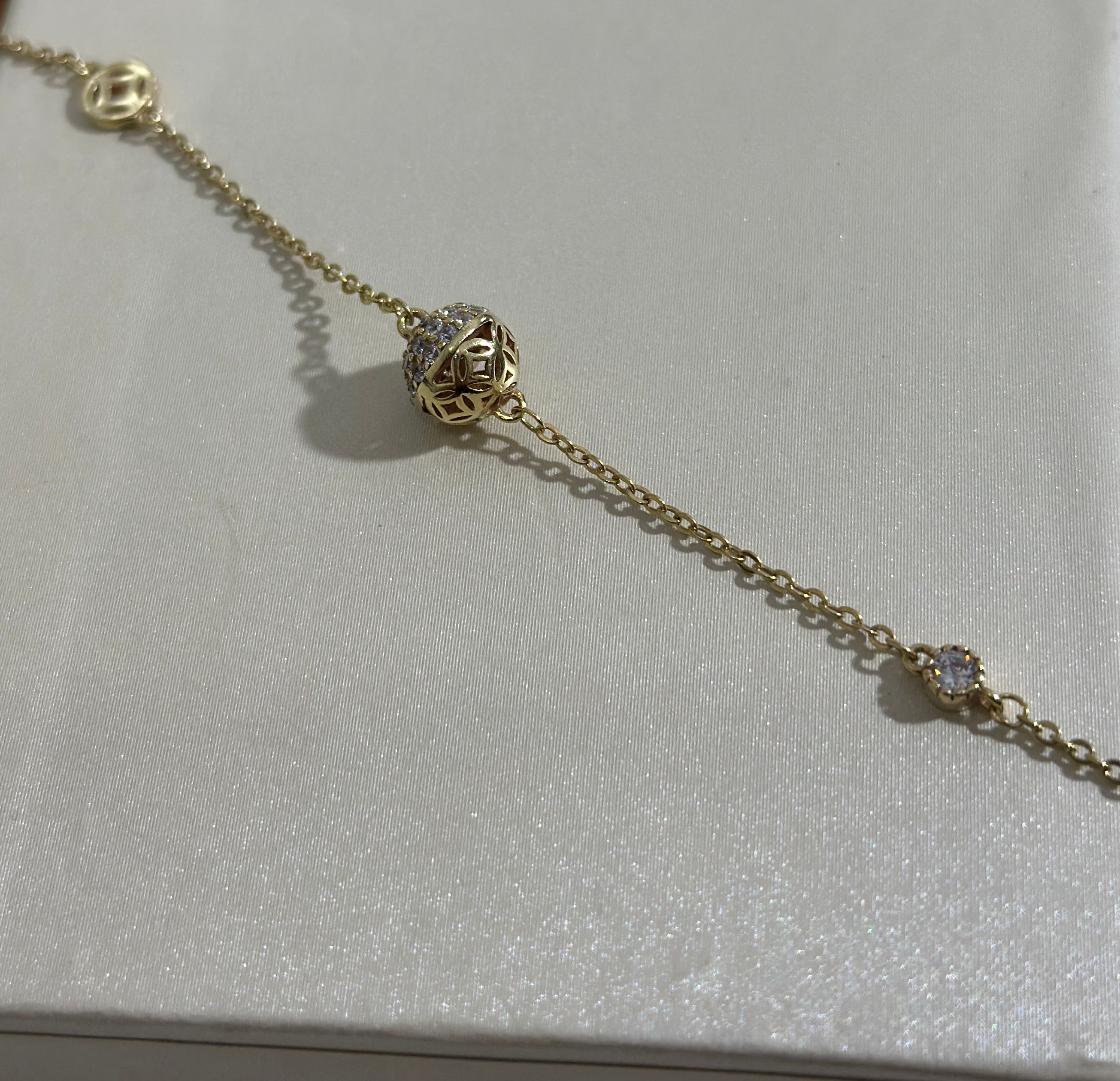 Pulsera de plata con mundito y circon   - Código K653