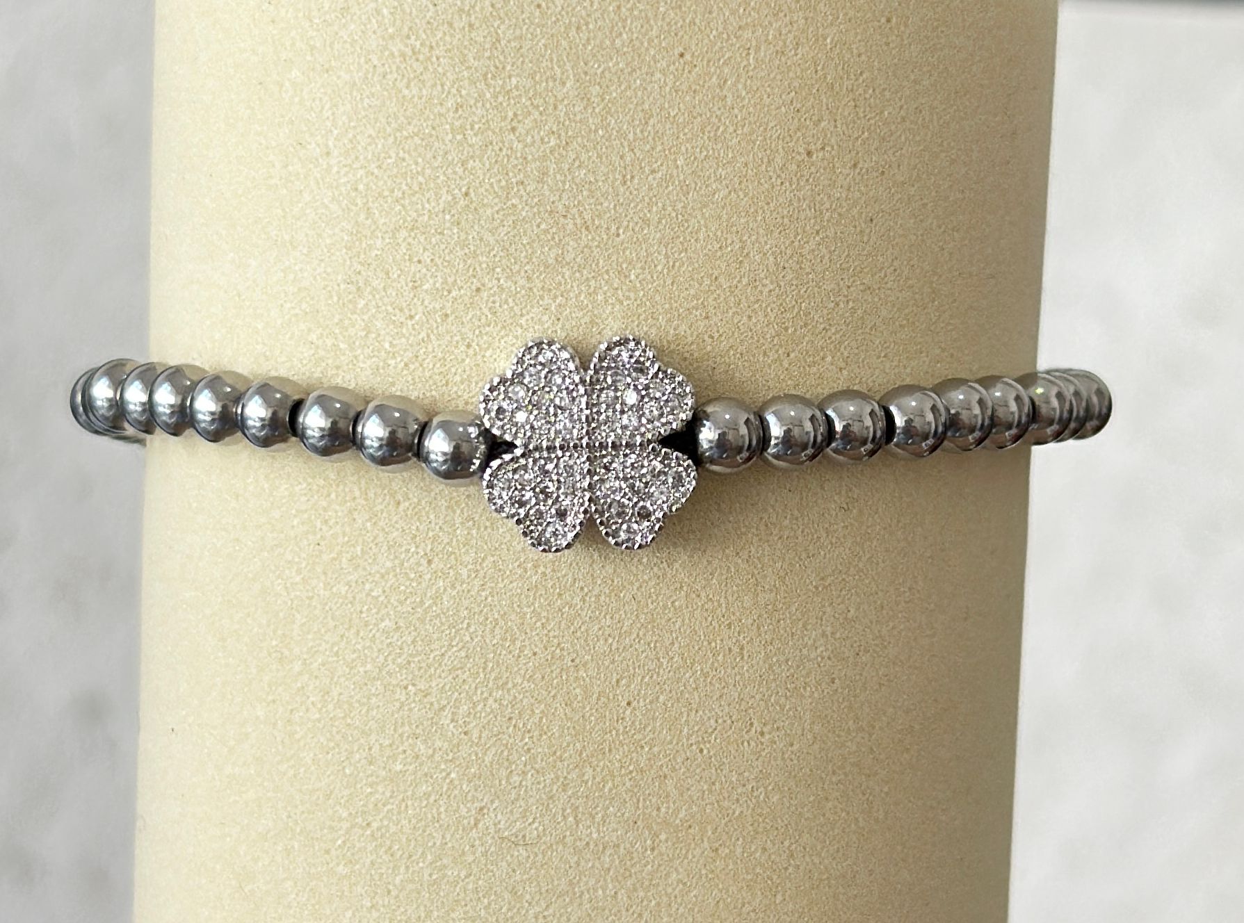 Pulsera de acero con flor y circones  - Código K609