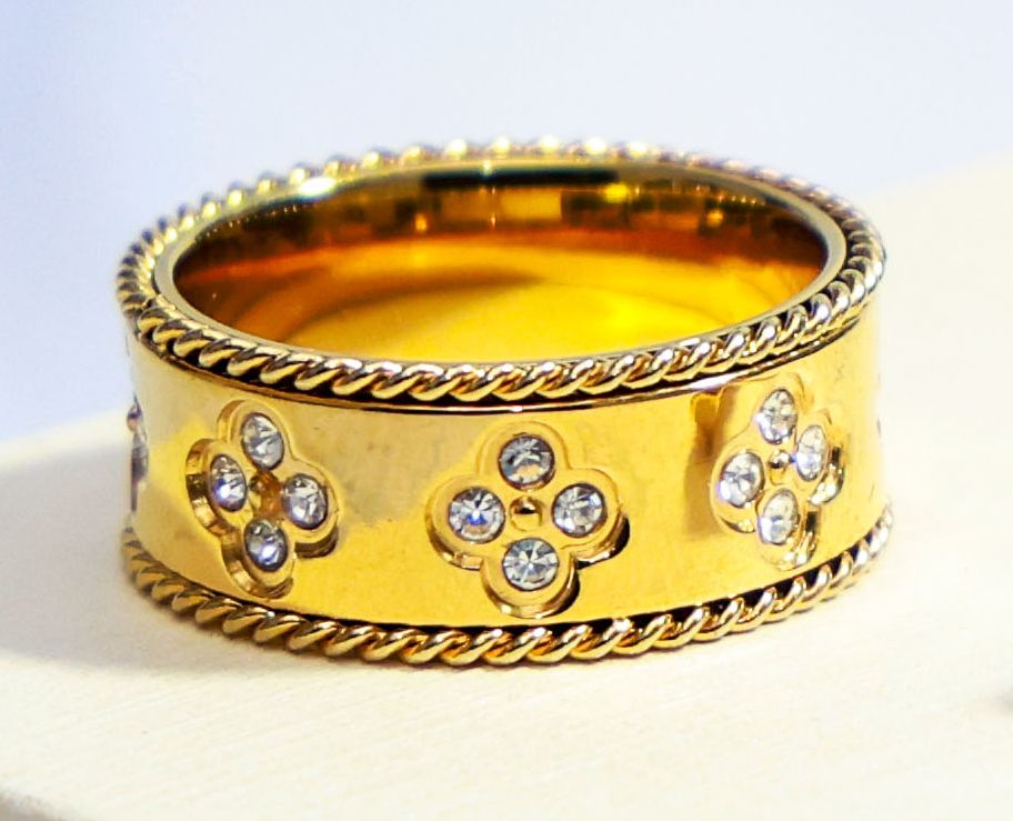 Anillo acero enchapado en oro con circones - Código K675