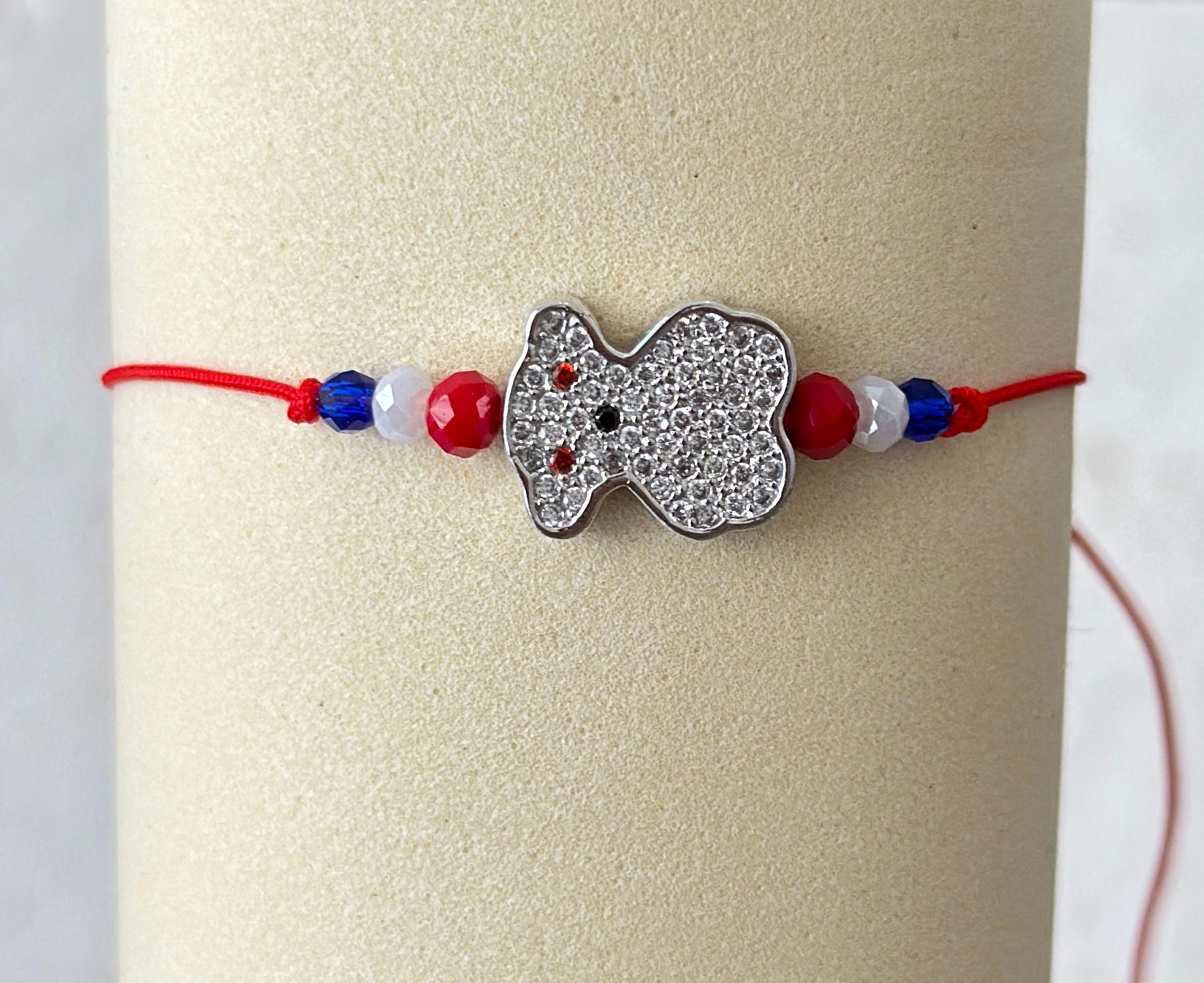 Pulsera hilo con osito y circones - Código K701