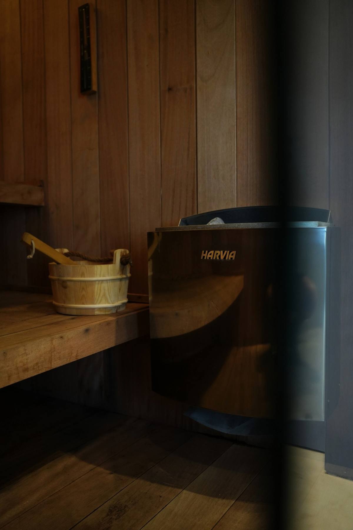 Harvia sauna heater and wooden bucket