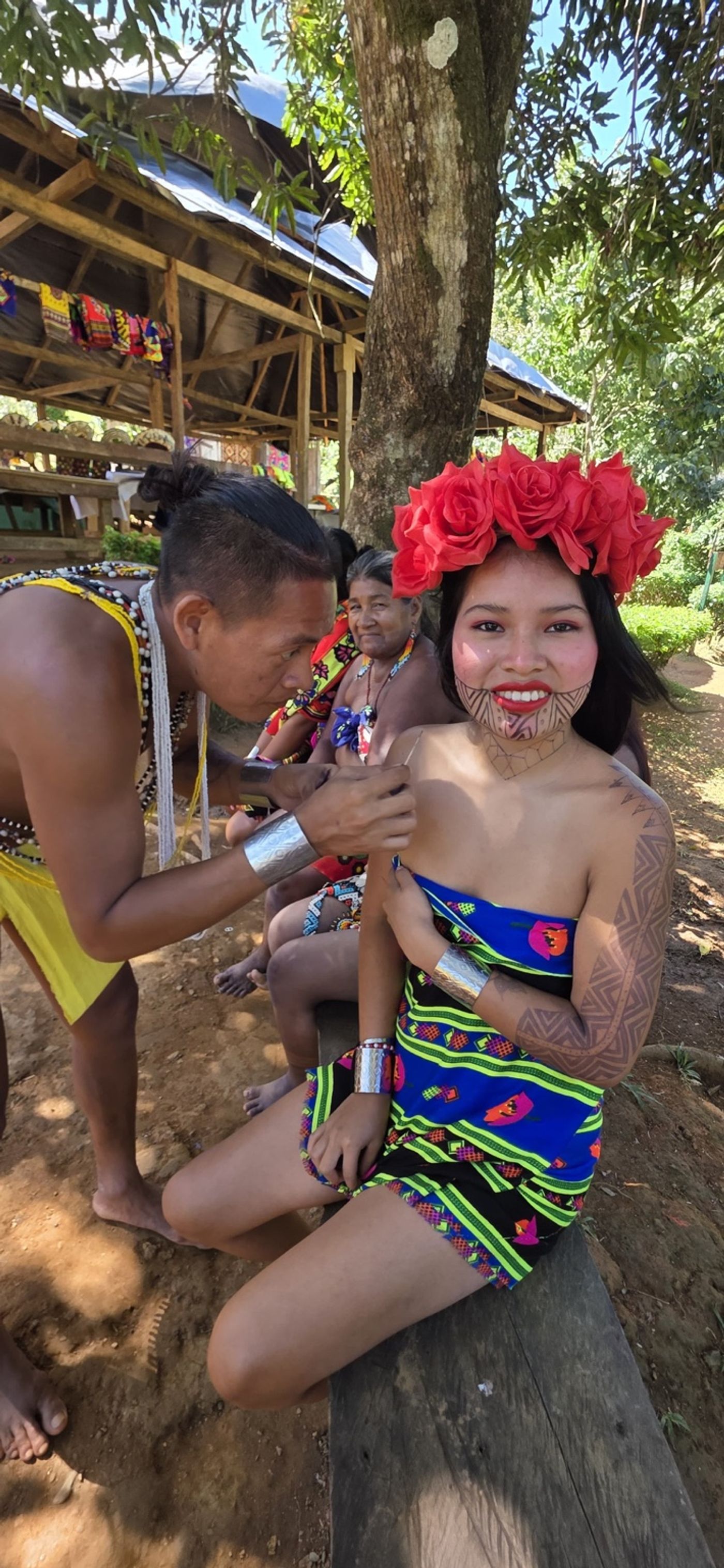 Travelers learning from Emberá hosts during a community-led cultural experience near Panama City.