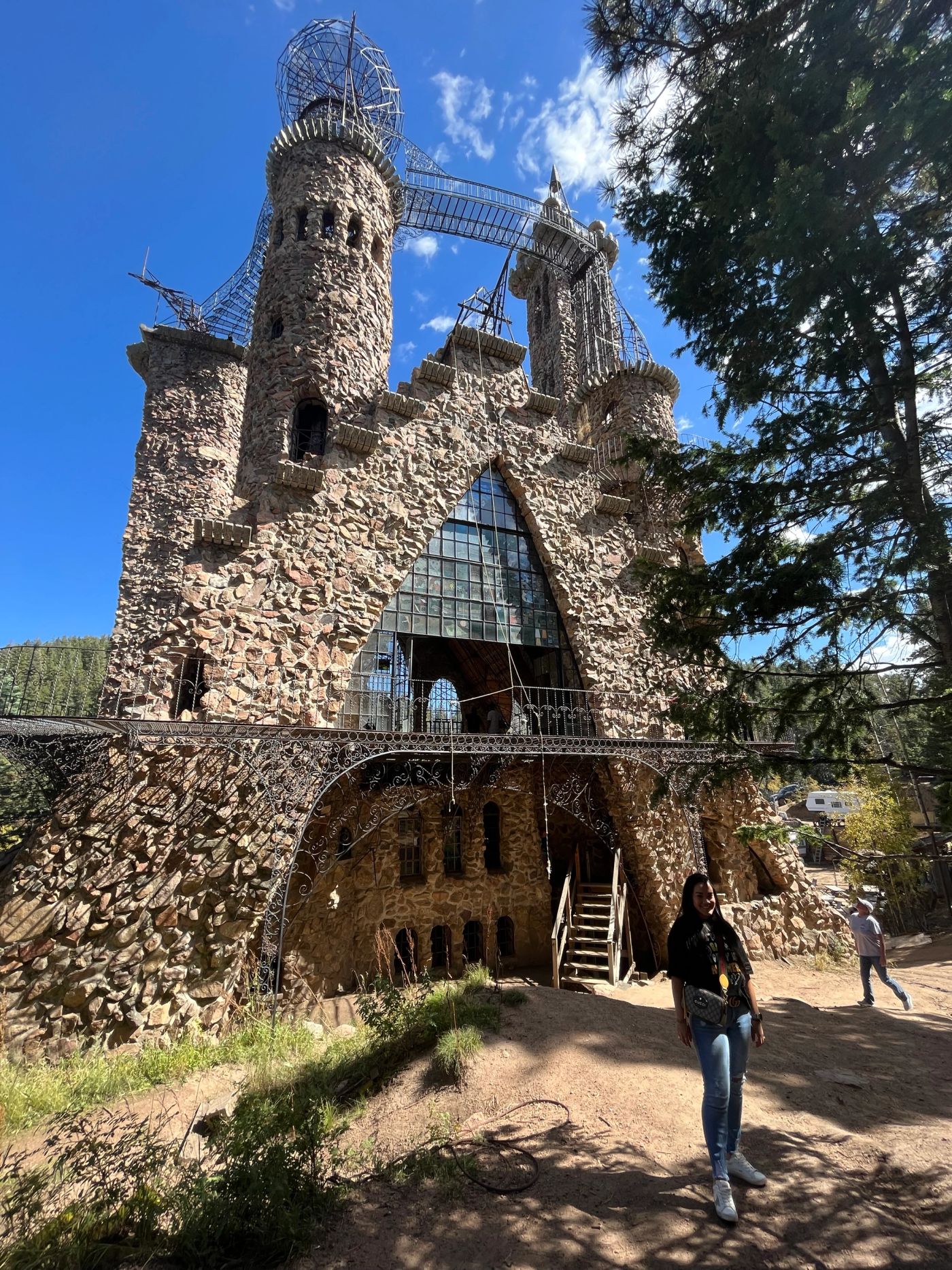 Bishop Castle rising through the forest in the mountains of Southern Colorado.