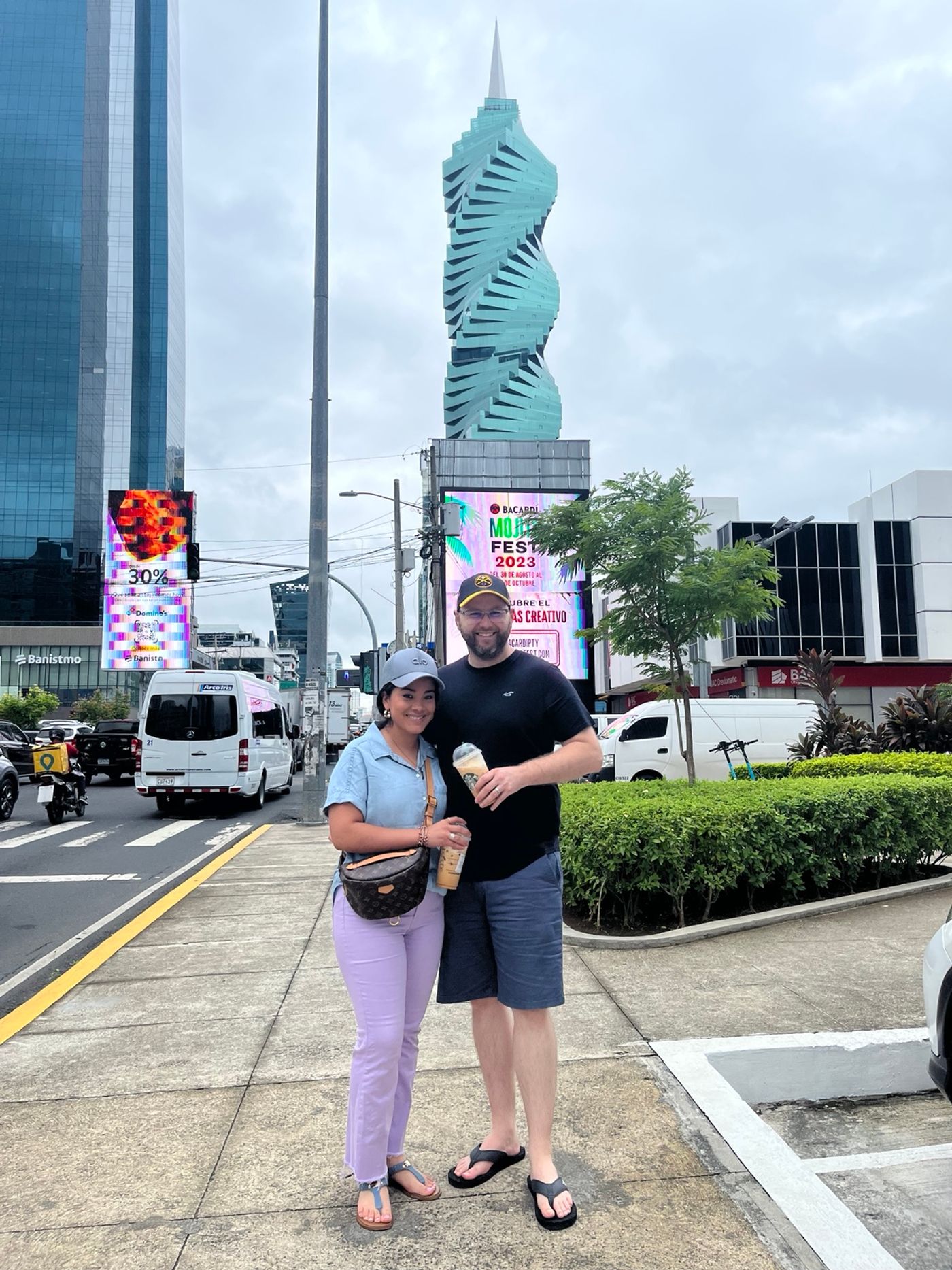 Jaury and Tyler in Panama City in front of the twisting F&F Tower