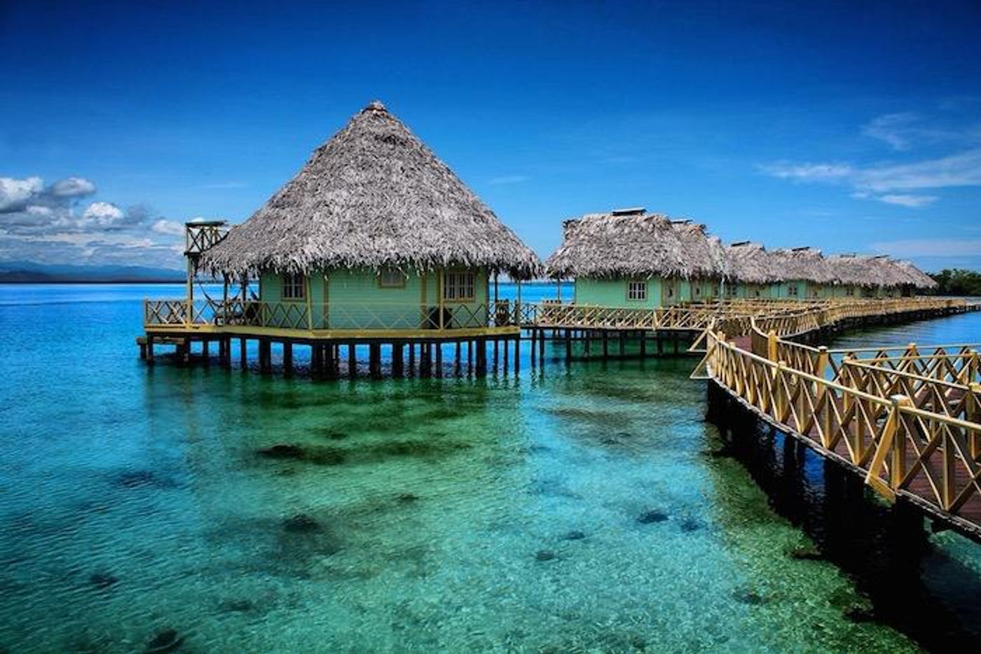 Overwater accommodations surrounded by tropical Caribbean scenery in Bocas del Toro, Panama.