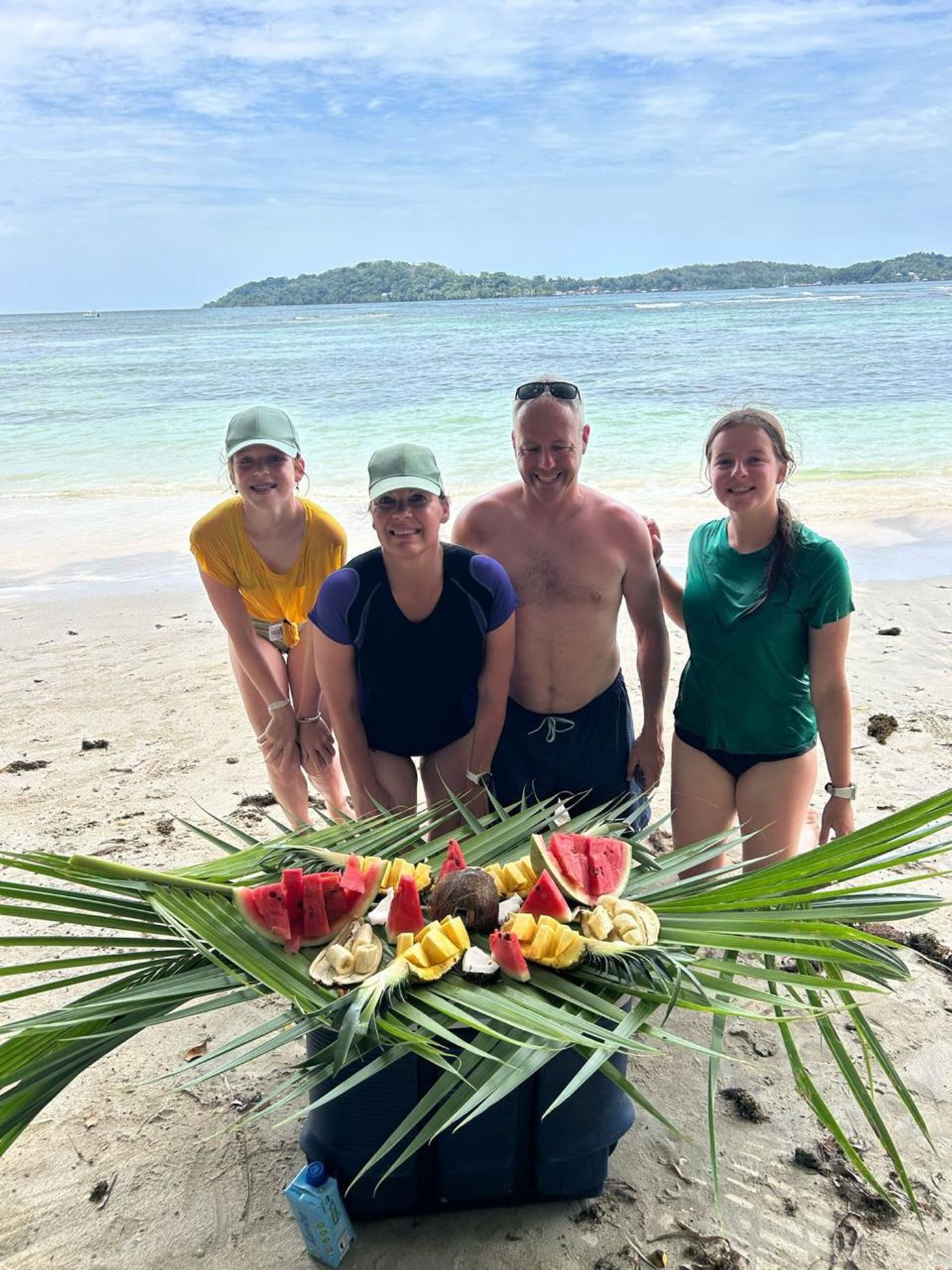 Family enjoying the Caribbean waters of Bocas del Toro, Panama.