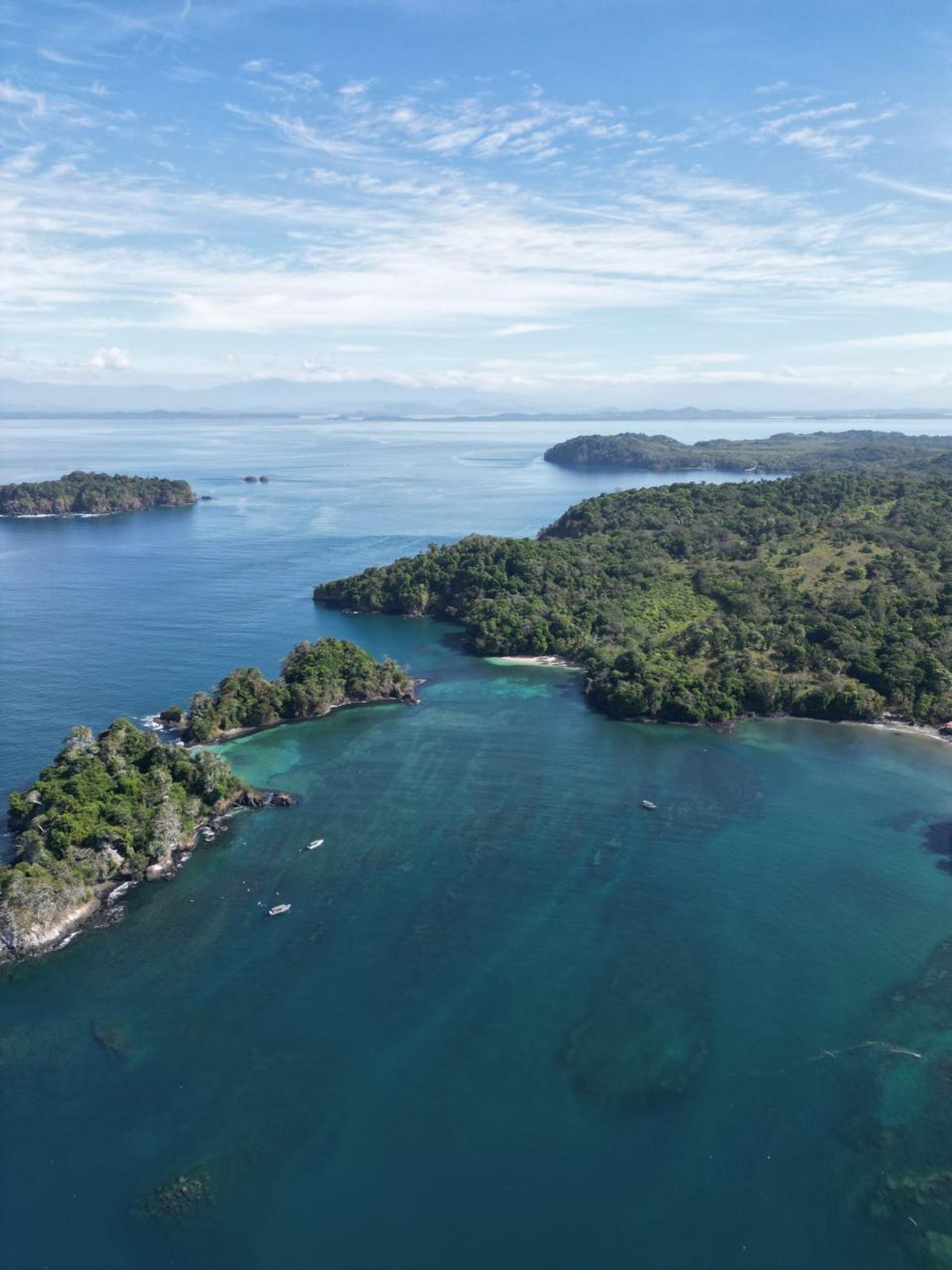 Tropical beach and Pacific coastline in Santa Catalina, Panama, surrounded by lush vegetation.