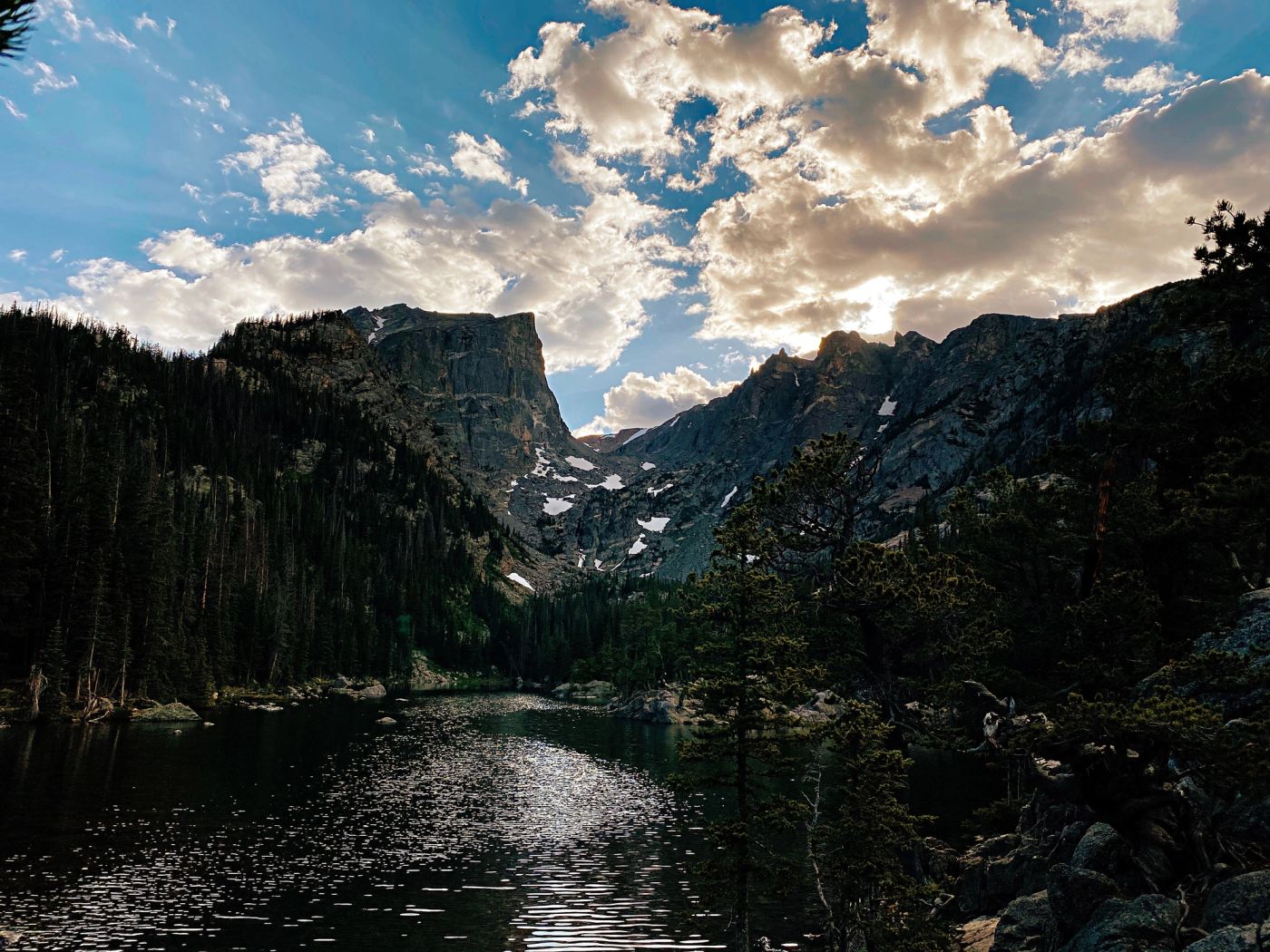 Emerald Lake surrounded by mountain peaks in Rocky Mountain National Park, Colorado.