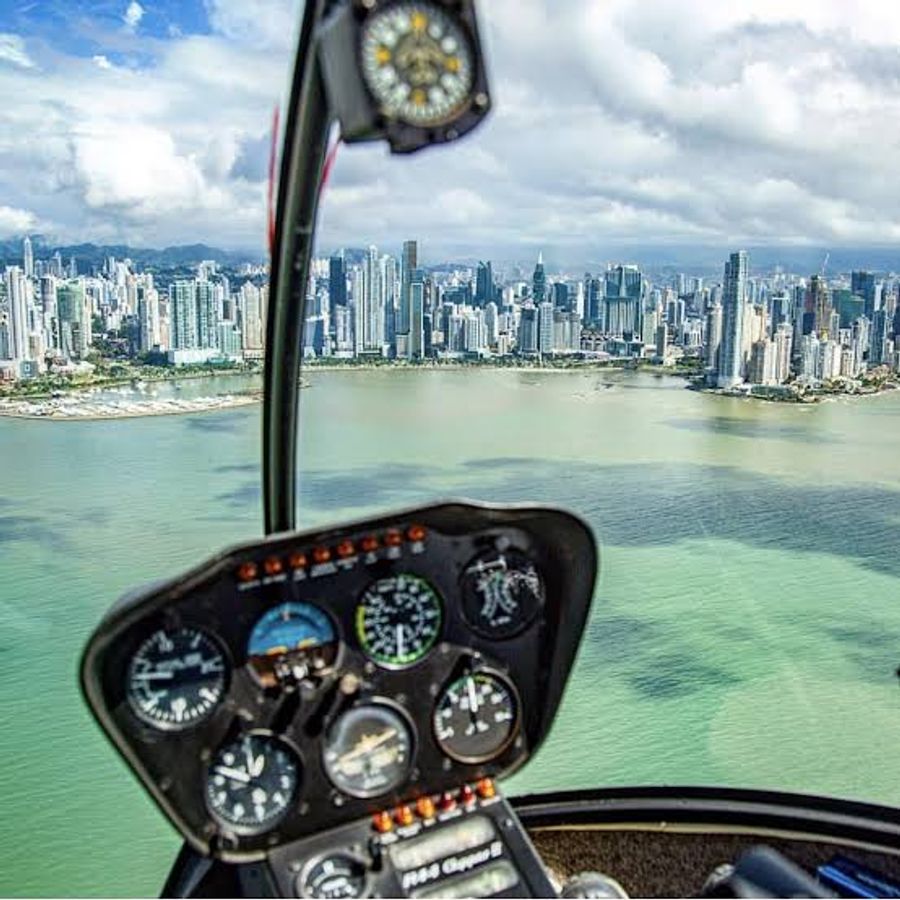 Private helicopter flight over Panama offering aerial views of the country’s tropical landscape.