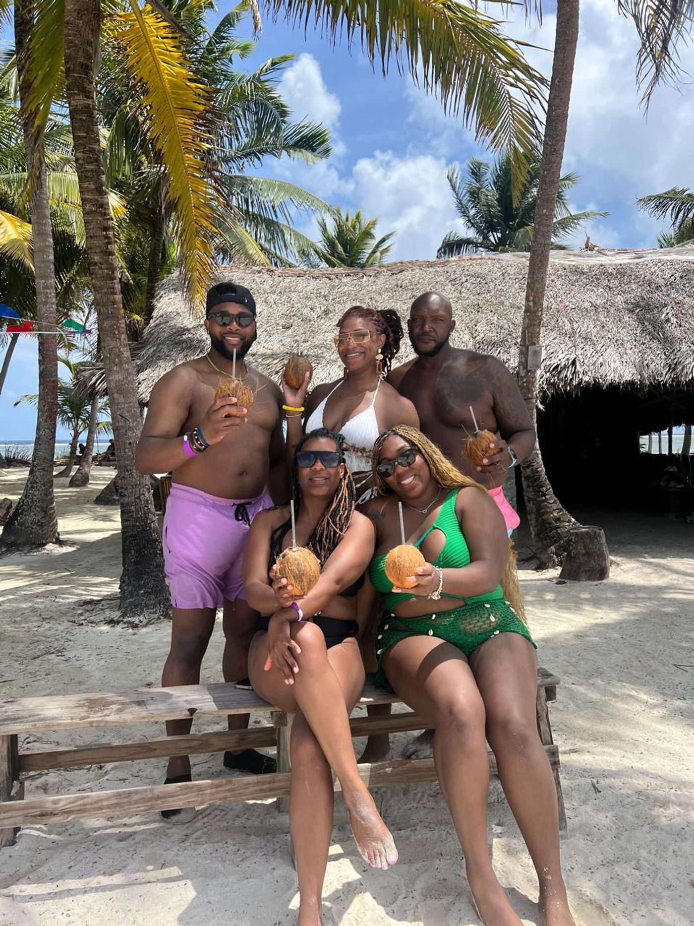 Family experiencing Guna culture during a visit to Guna Yala, Panama.