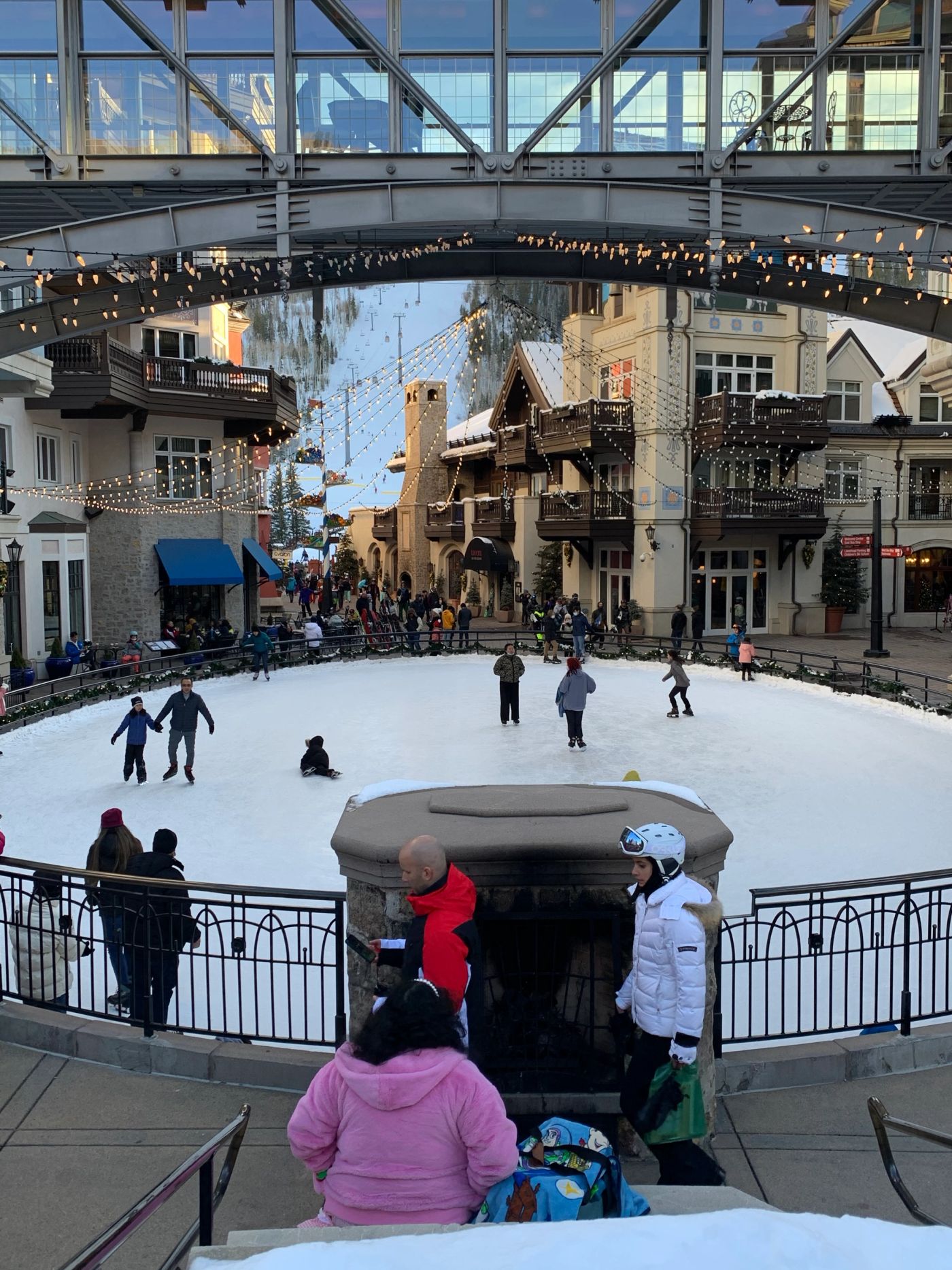 Winter evening at the outdoor ice rink in Lionshead Village, Vail.
