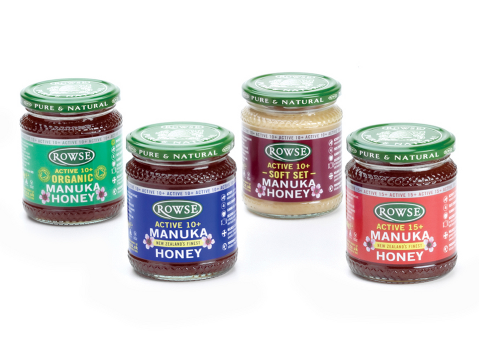 four jars of rowse honey sit next to each other