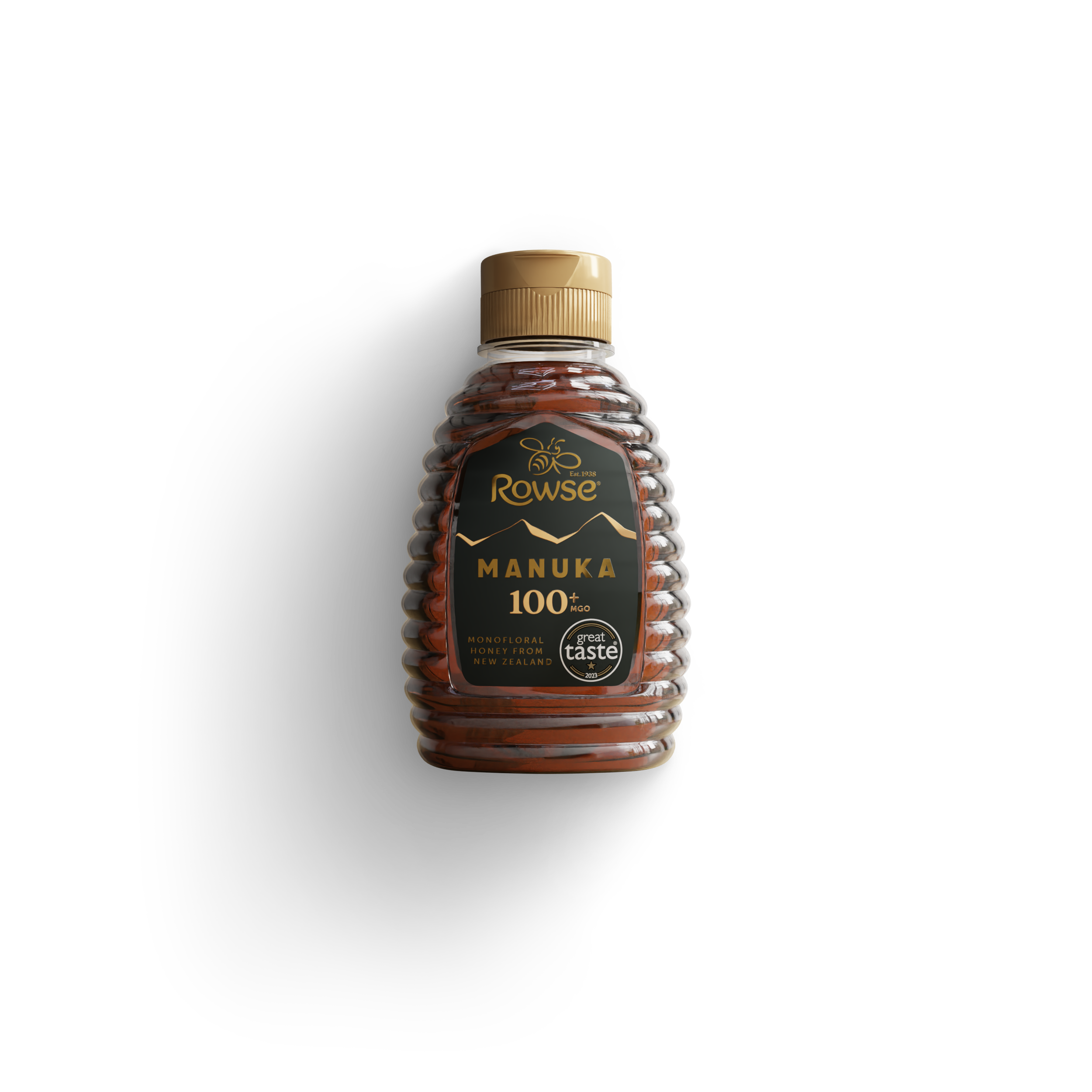 Rowse Manuka 100% pure honey in a beehive-shaped bottle with a gold cap.
