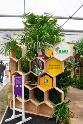 a display with a sign that says bees on it