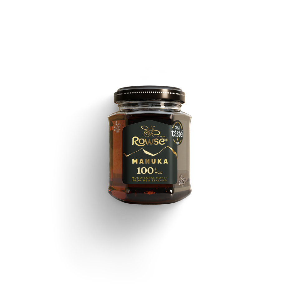 Rowse Manuka Honey 100+ MGO jar with a "great taste" seal.
