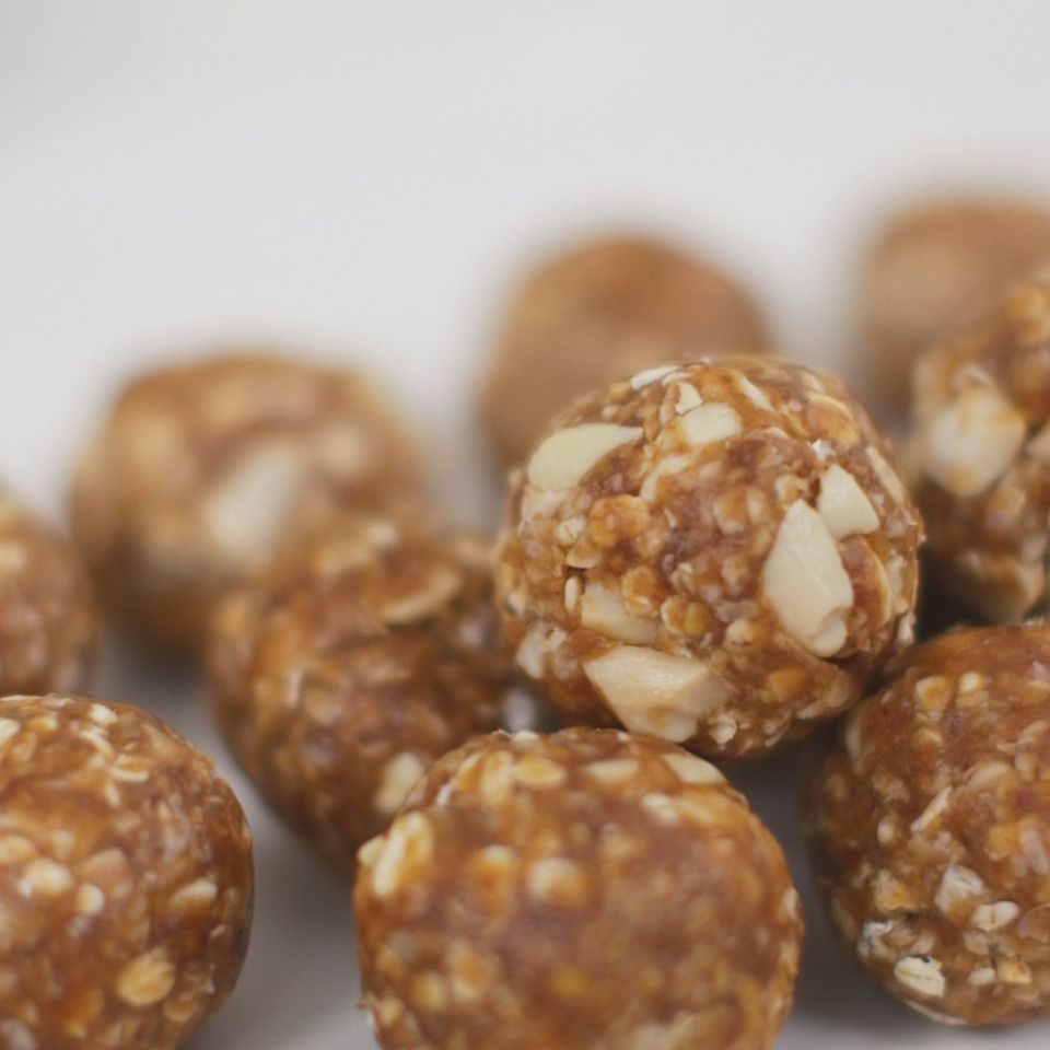 a close up of a plate of energy balls on a table .