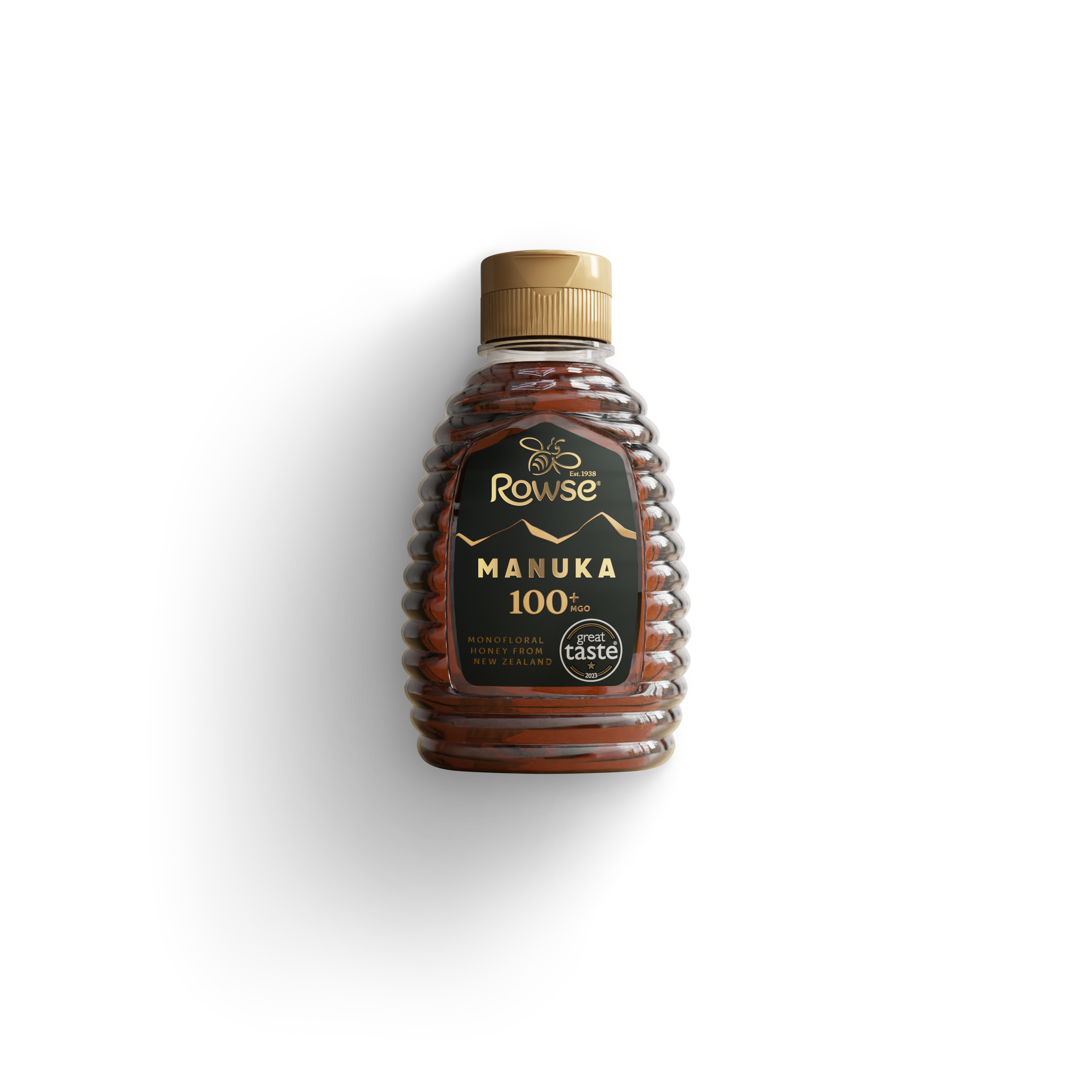 Rowse Manuka 100% pure honey in a beehive-shaped bottle with a gold cap.