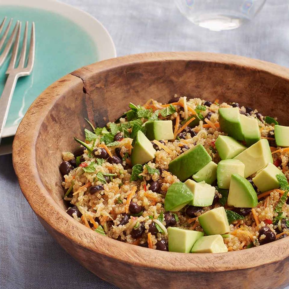 Warm black bean and quinoa salad with avocado, honey and lime