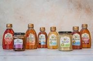 there are many different types of honey on the table .