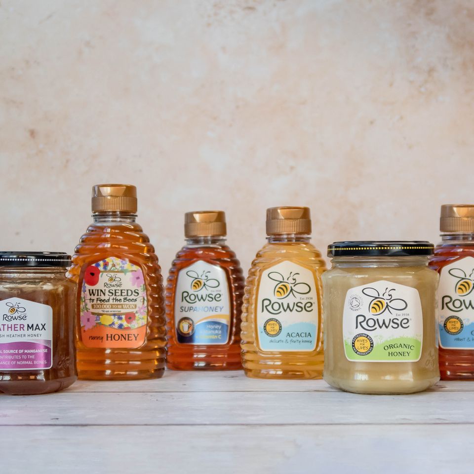 there are many different types of honey on the table .