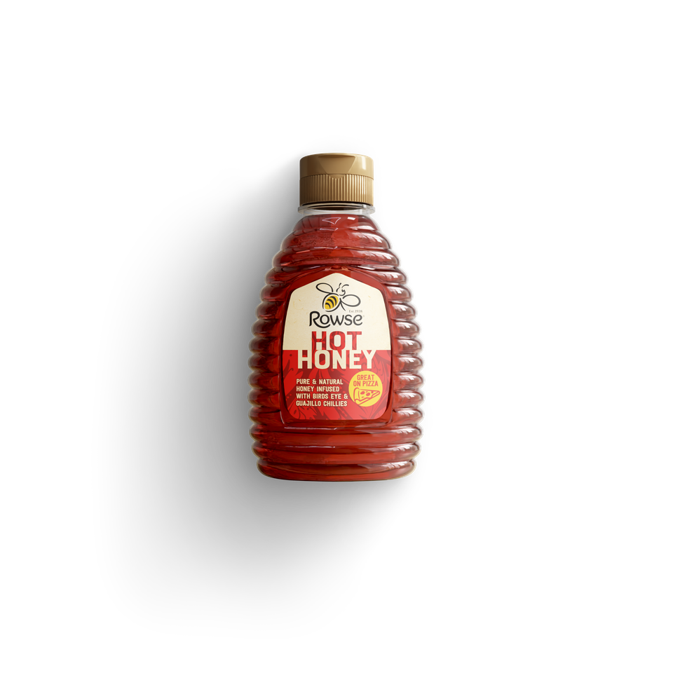 a bottle of rowse hot honey on a white background