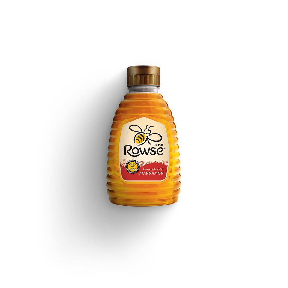 a bottle of Rowse Honey with a hint of cinnamon