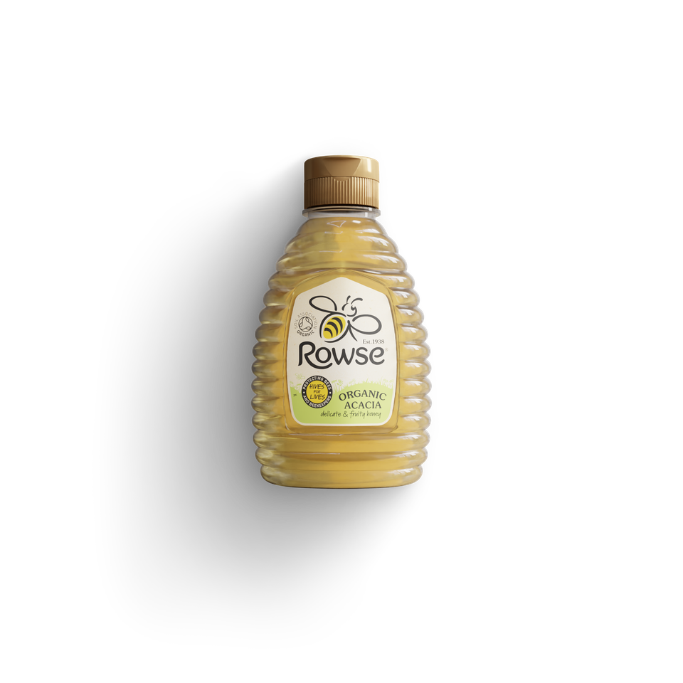 a bottle of rowse organic acacia honey