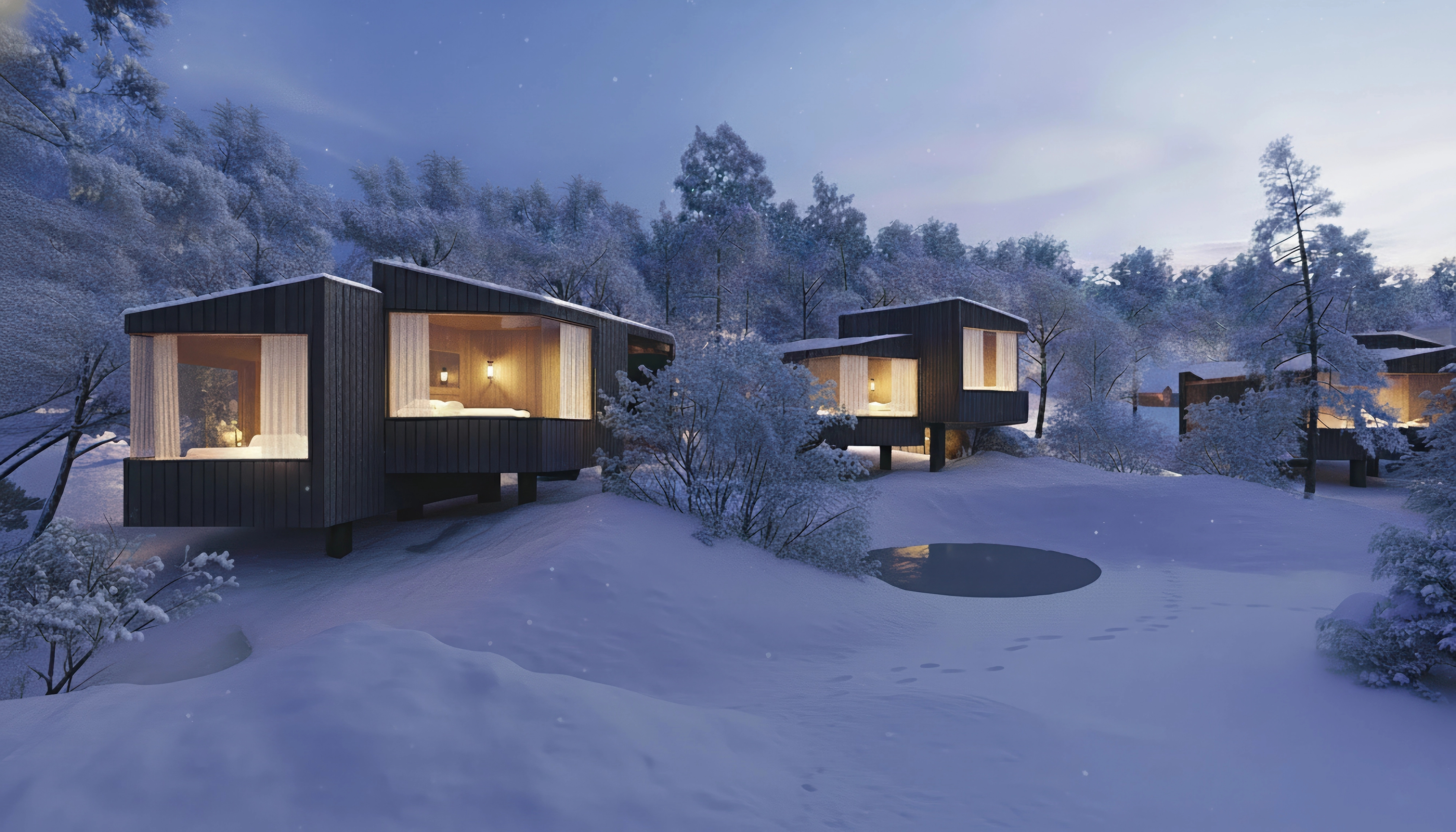 Timber cabins in snowy landscape