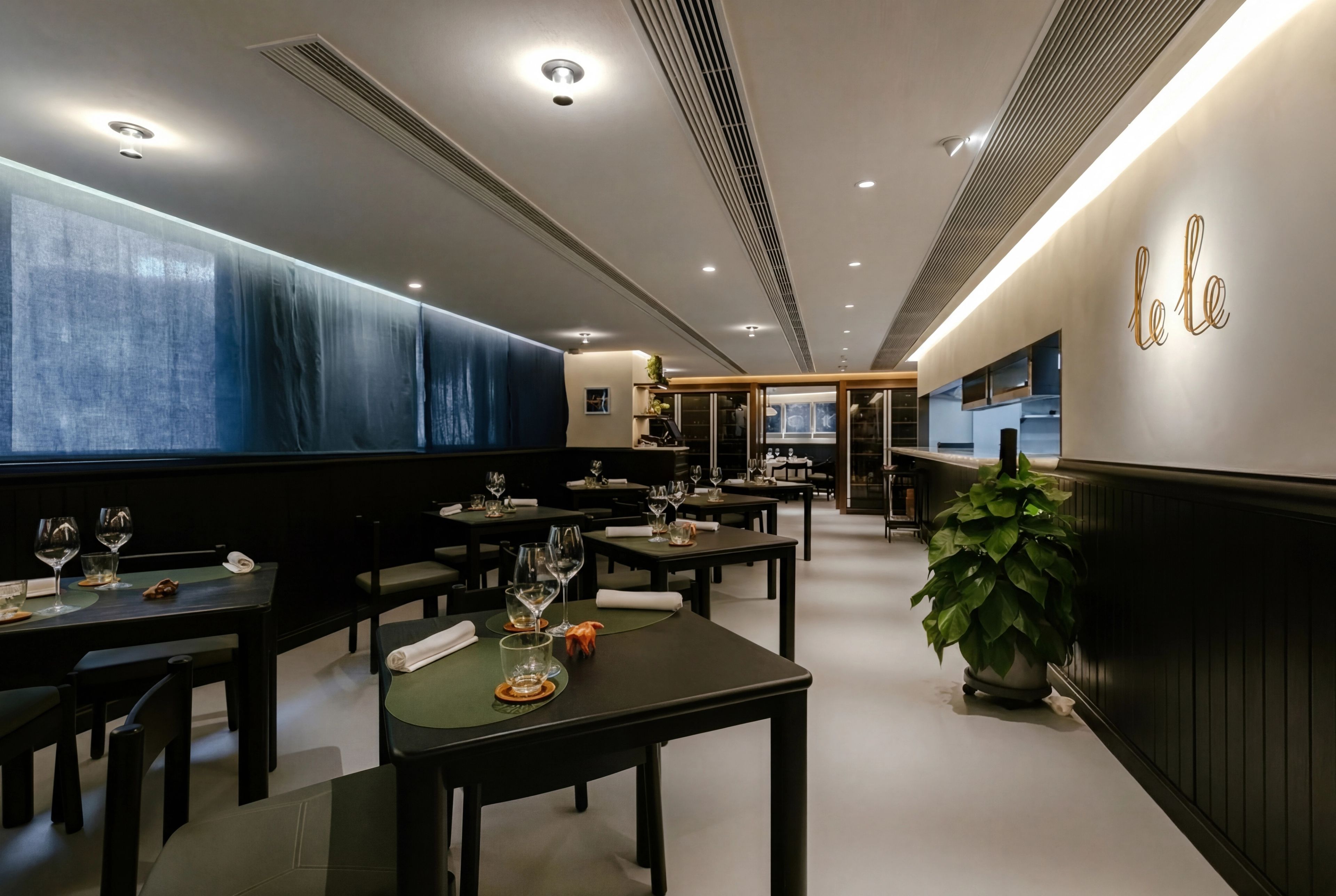 Minimal restaurant interior with black wood furniture