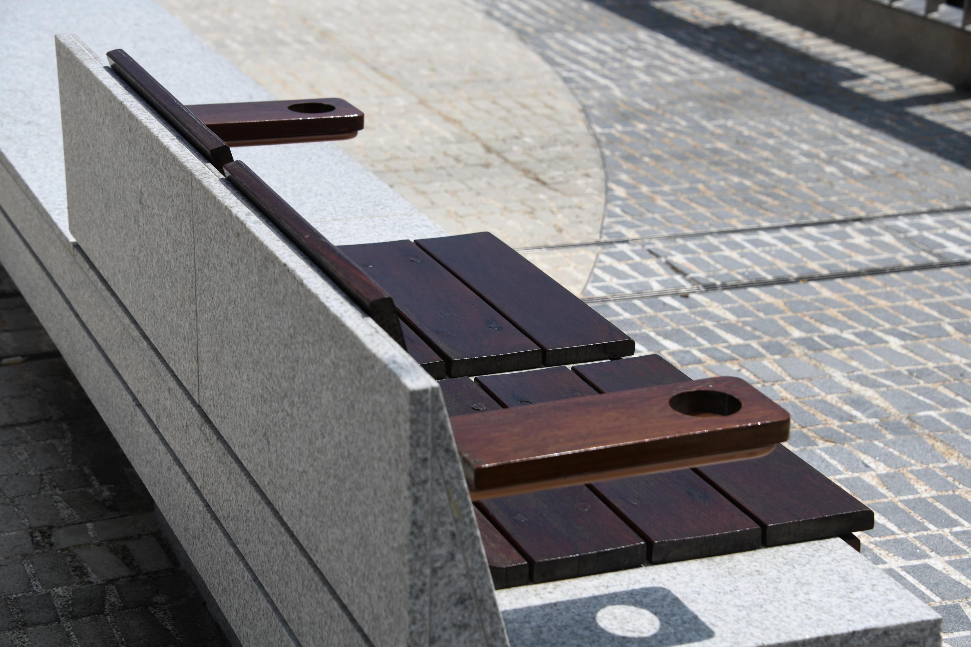 Detail of stone bench with timber seat