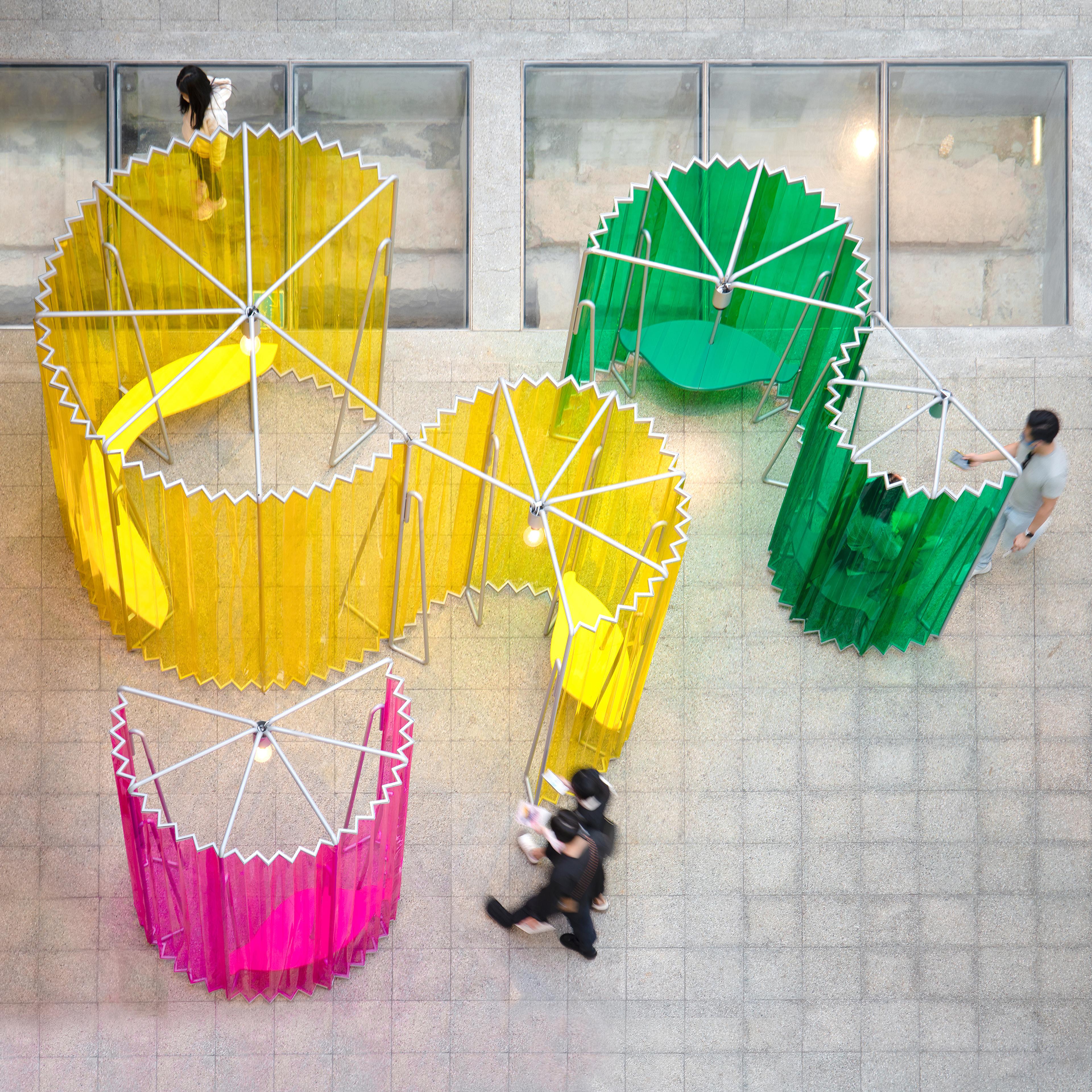 top down view of colorful installation inside building courtyard