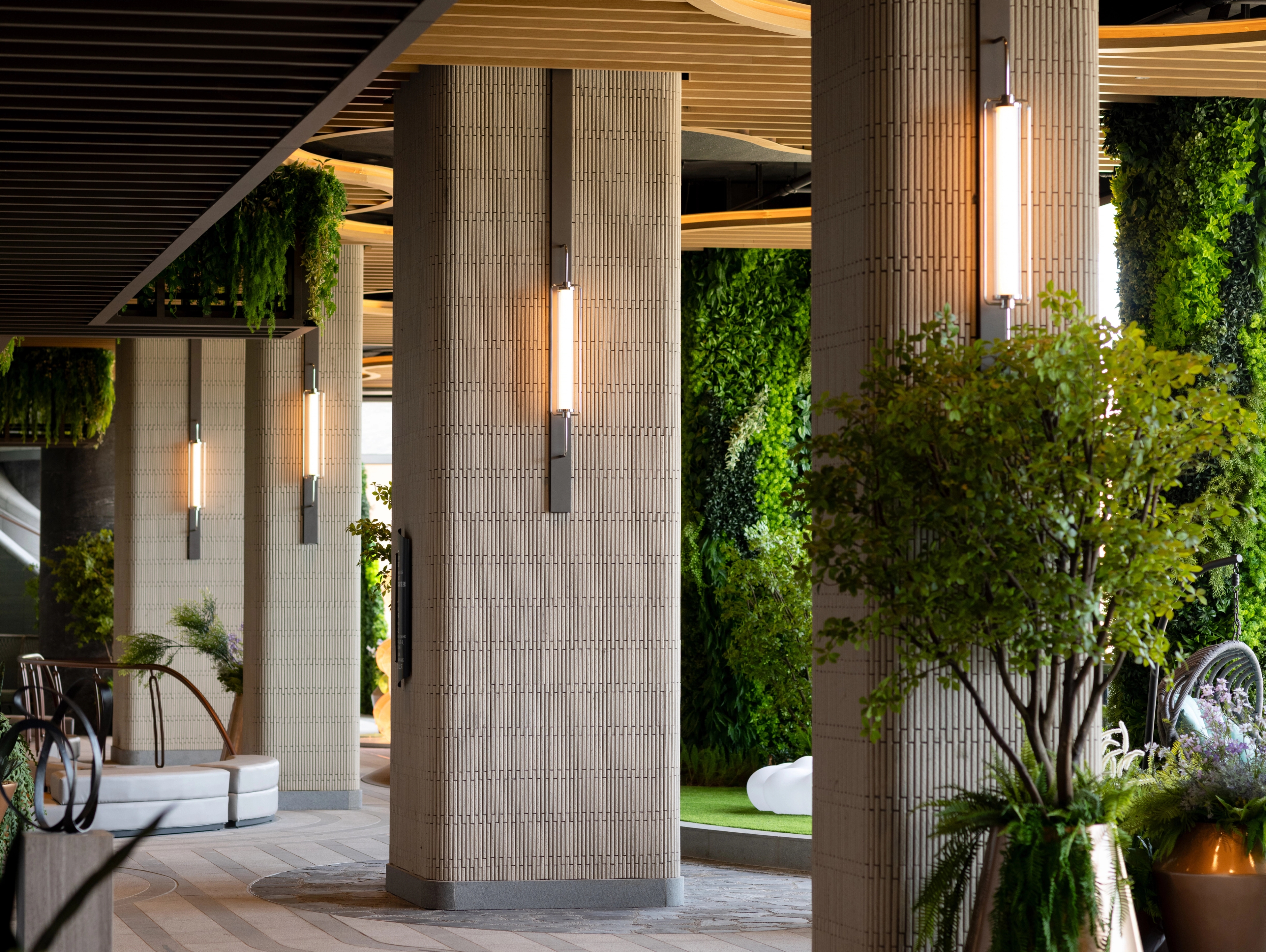 sky garden lounge with stone walls and bespoke lighting