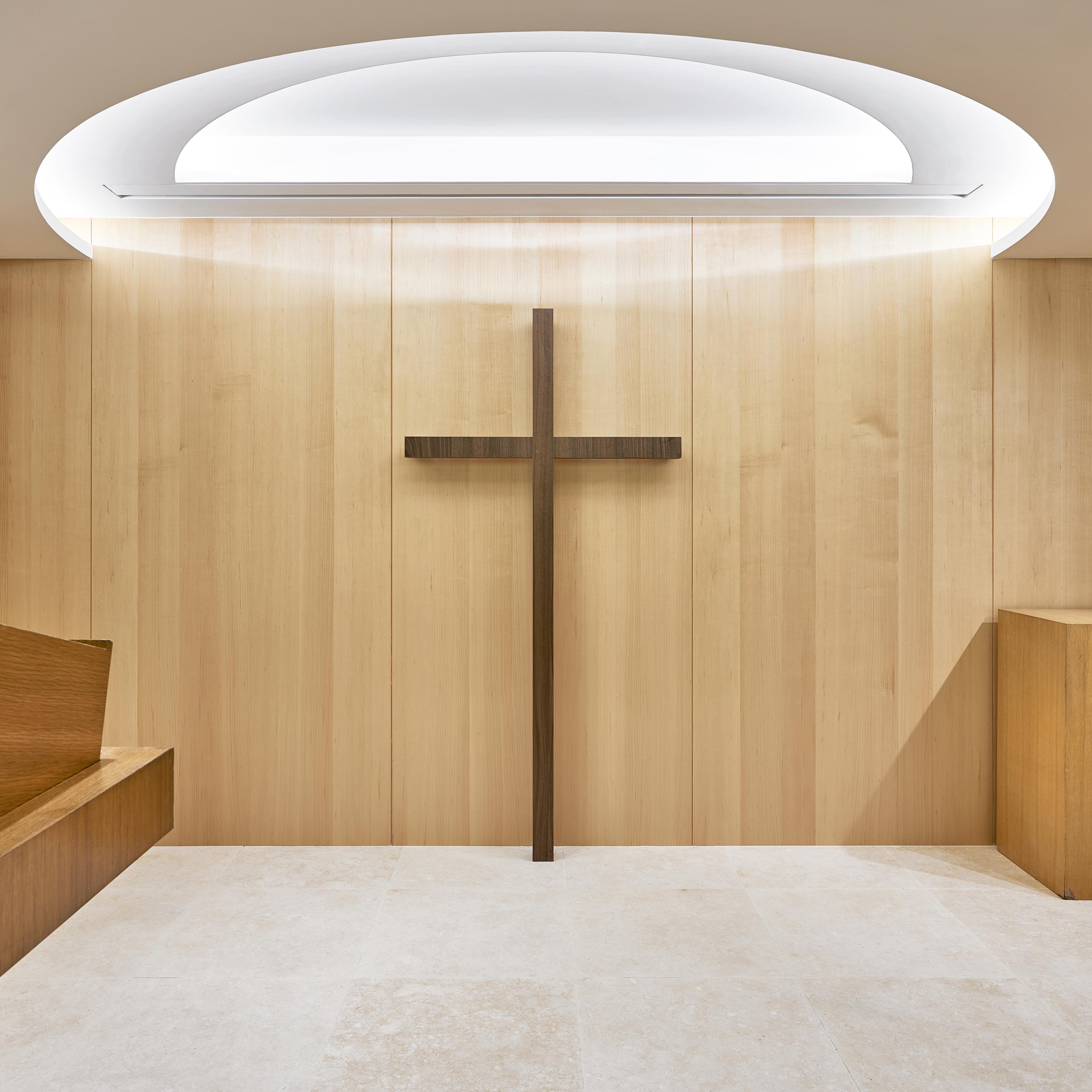 modern church interior alcove with cross
