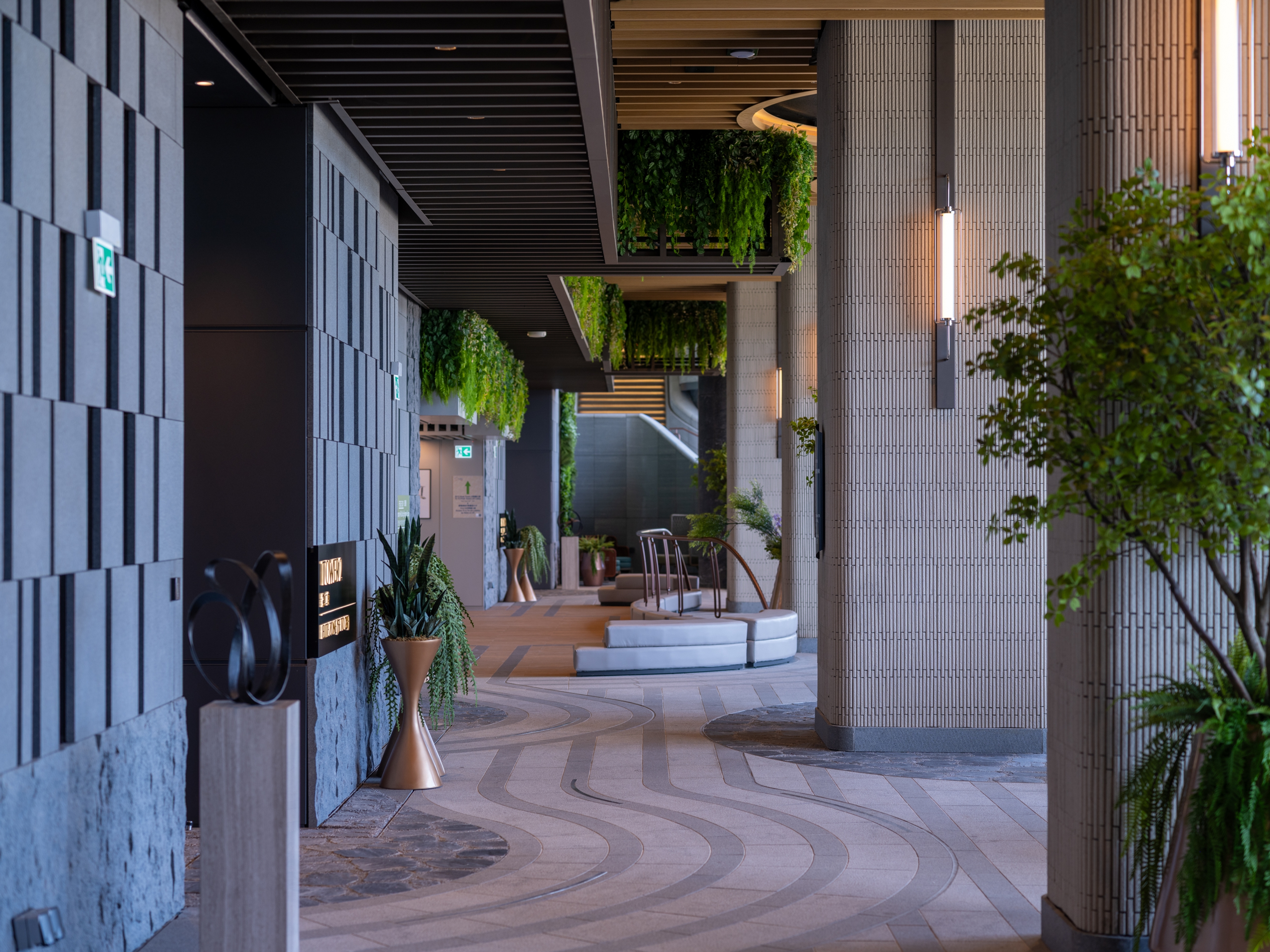 sky garden lounge with stone walls and bespoke lighting