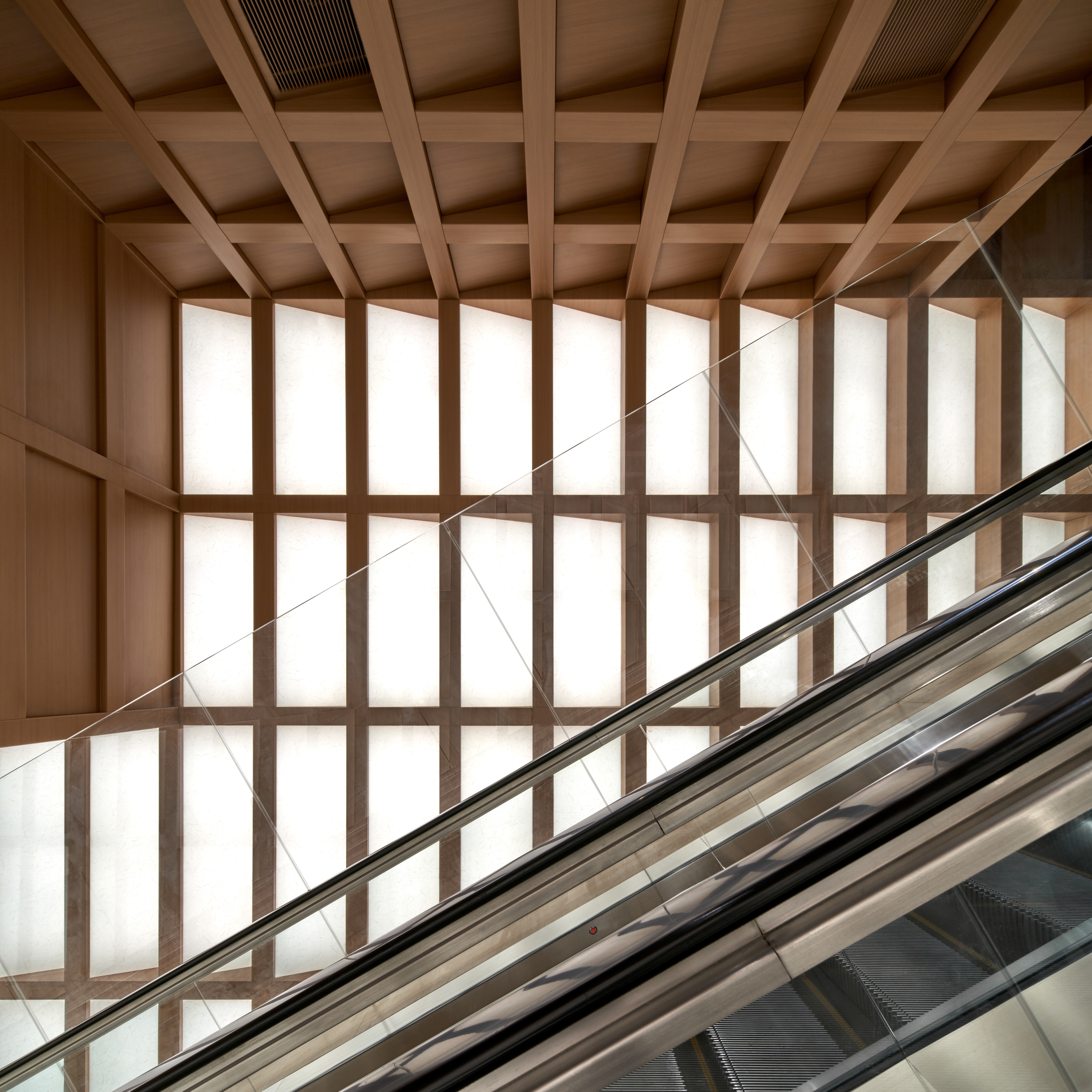 Elevation of escalator with white shoji paper light panel