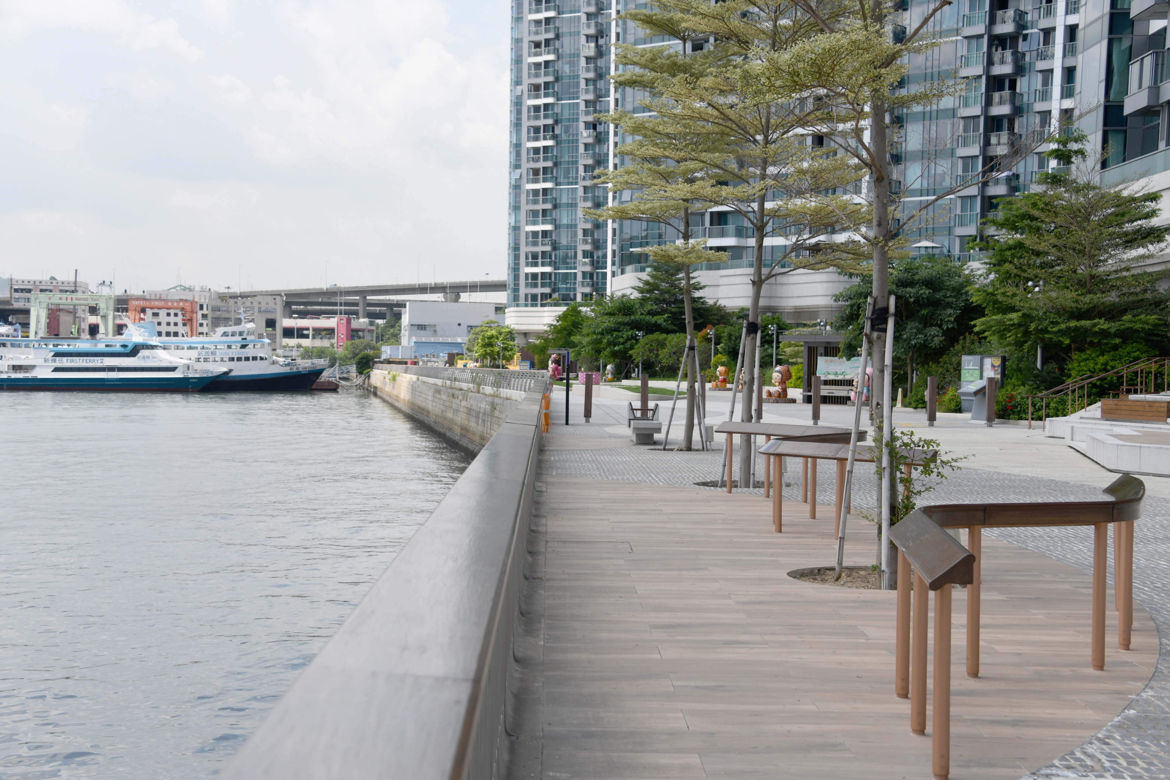View of promenade with balustrade and curved wooden backrest