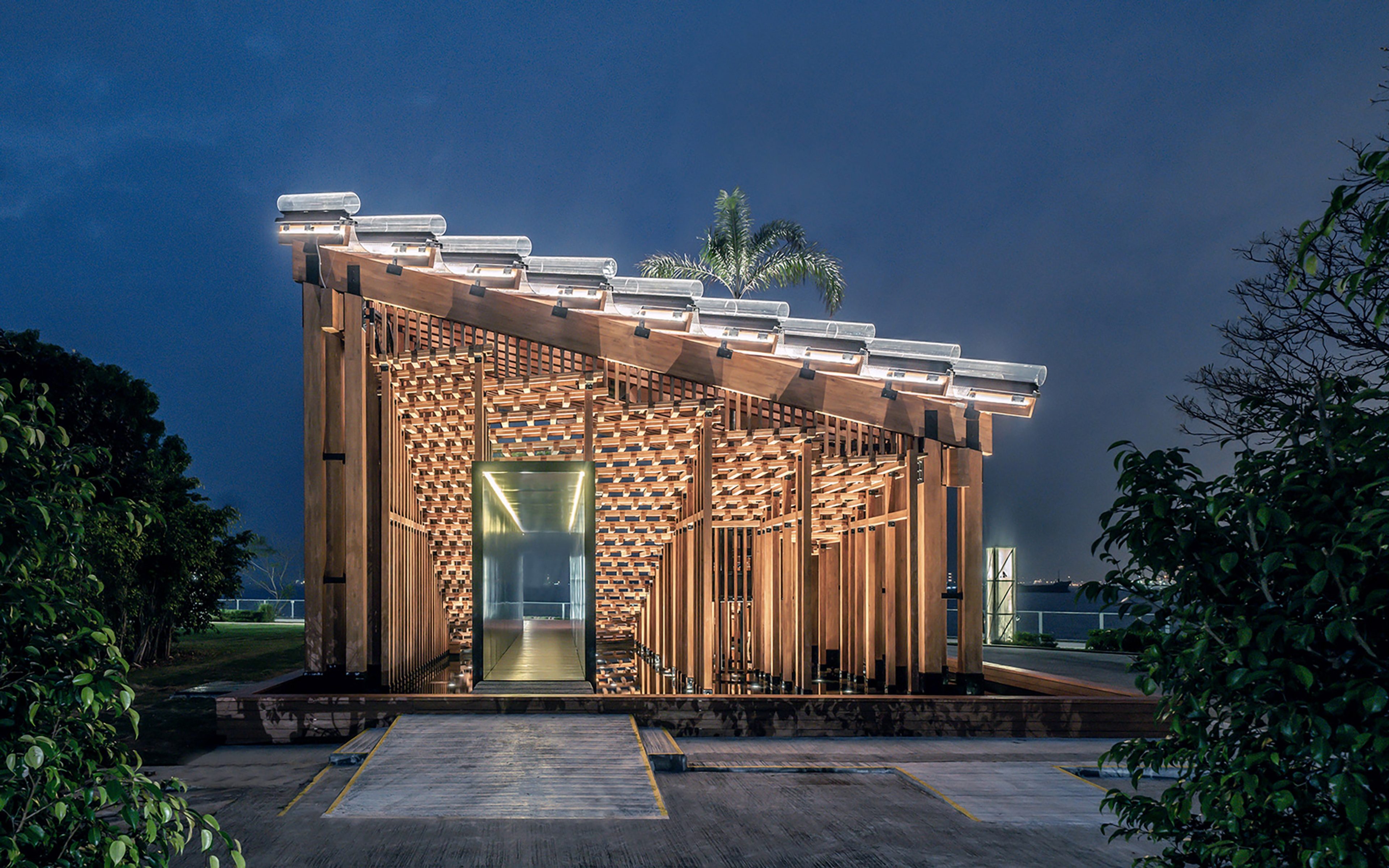 Pavilion in night time with sky in background