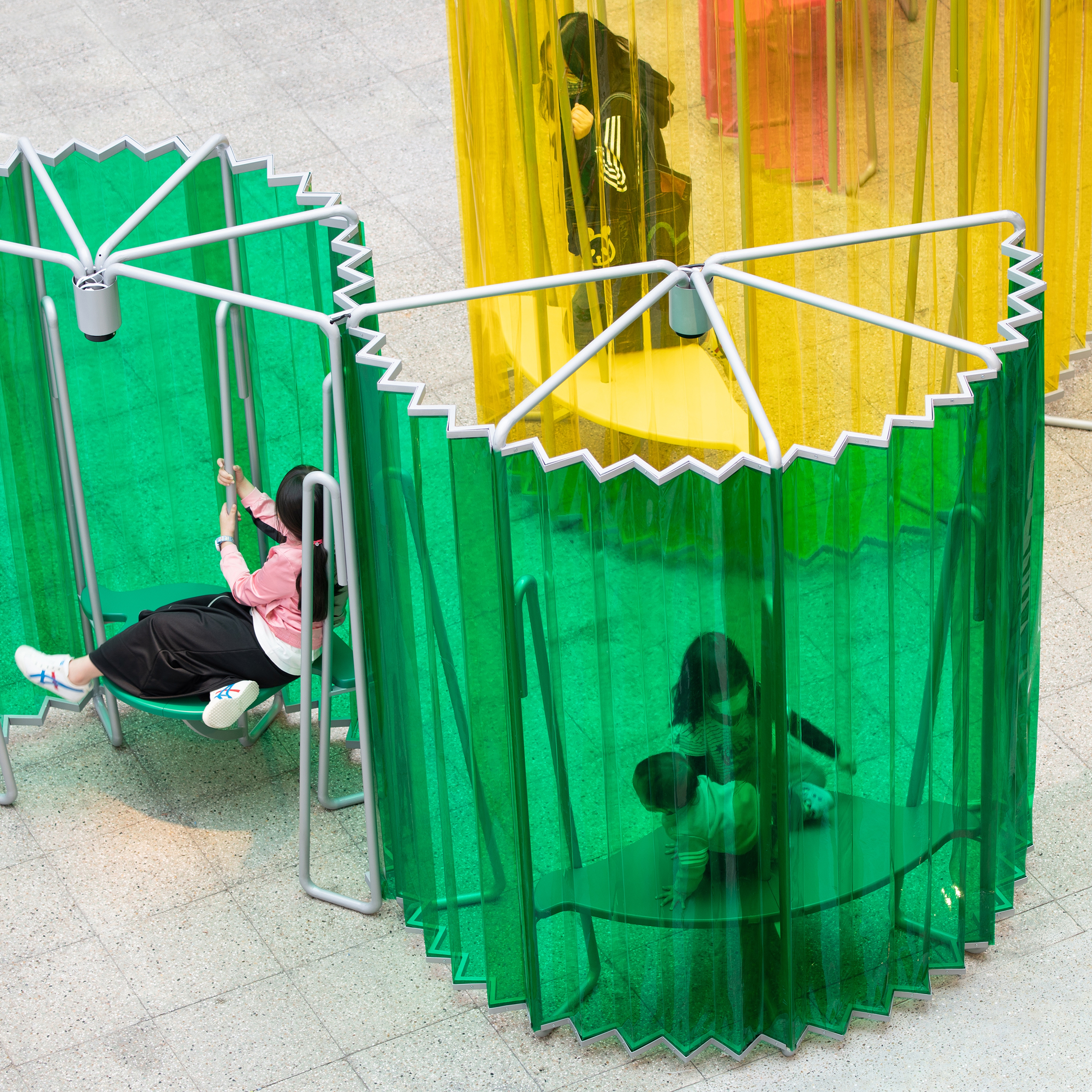 top side view of colorful installation inside building courtyard