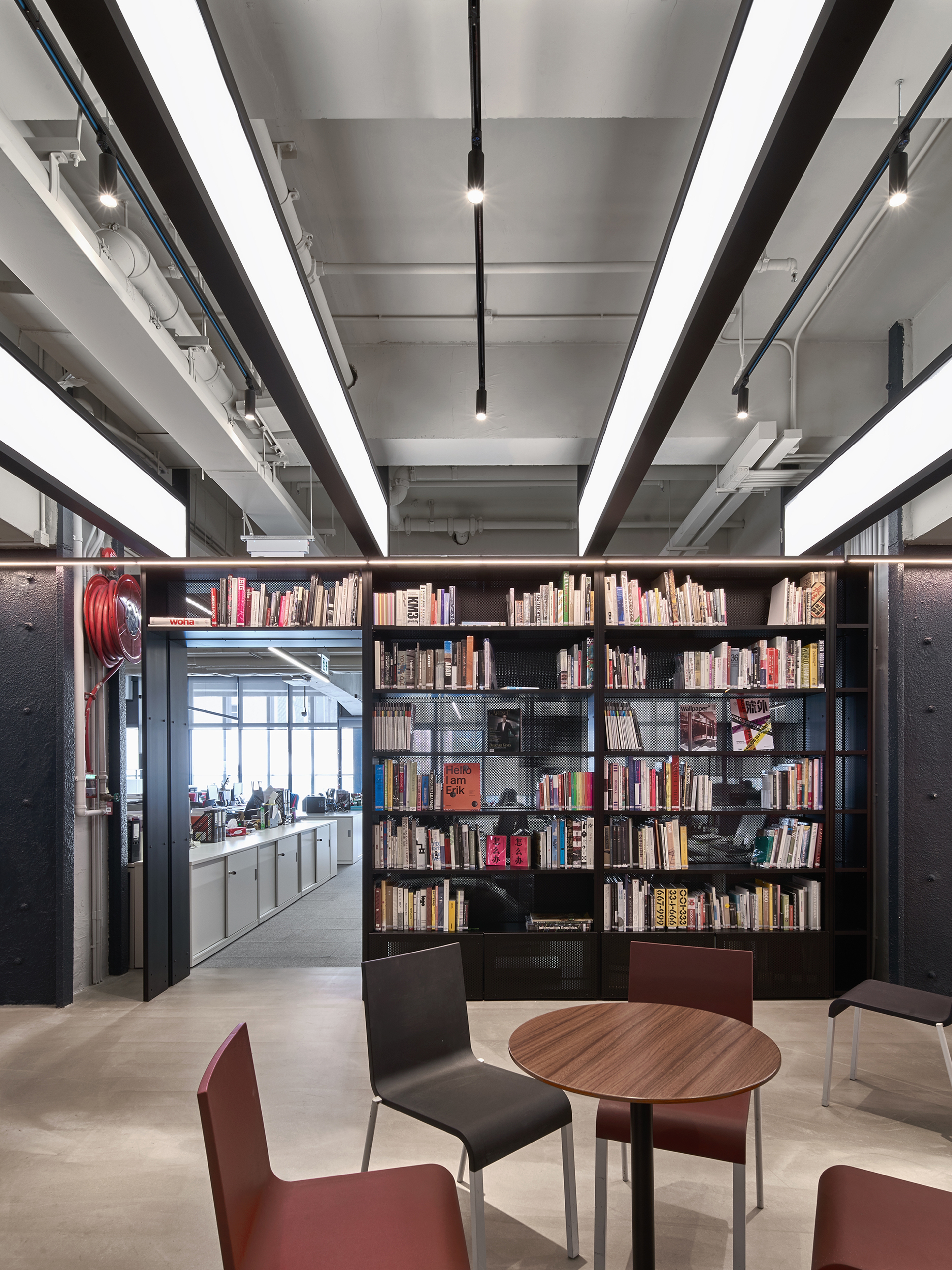 modern office interior library with meeting table and chairs