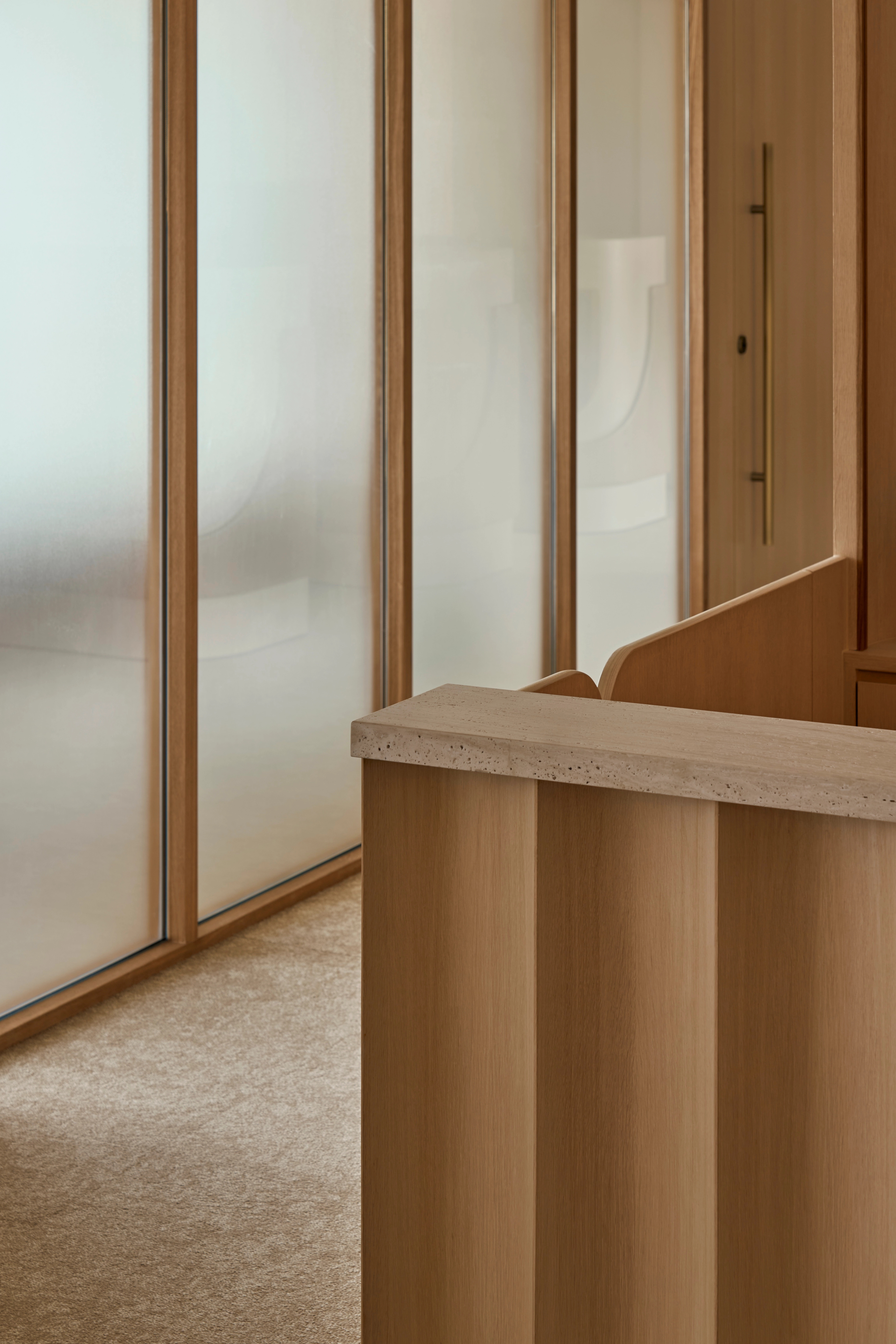 seamless blend of textured wood and sleek frosted glass