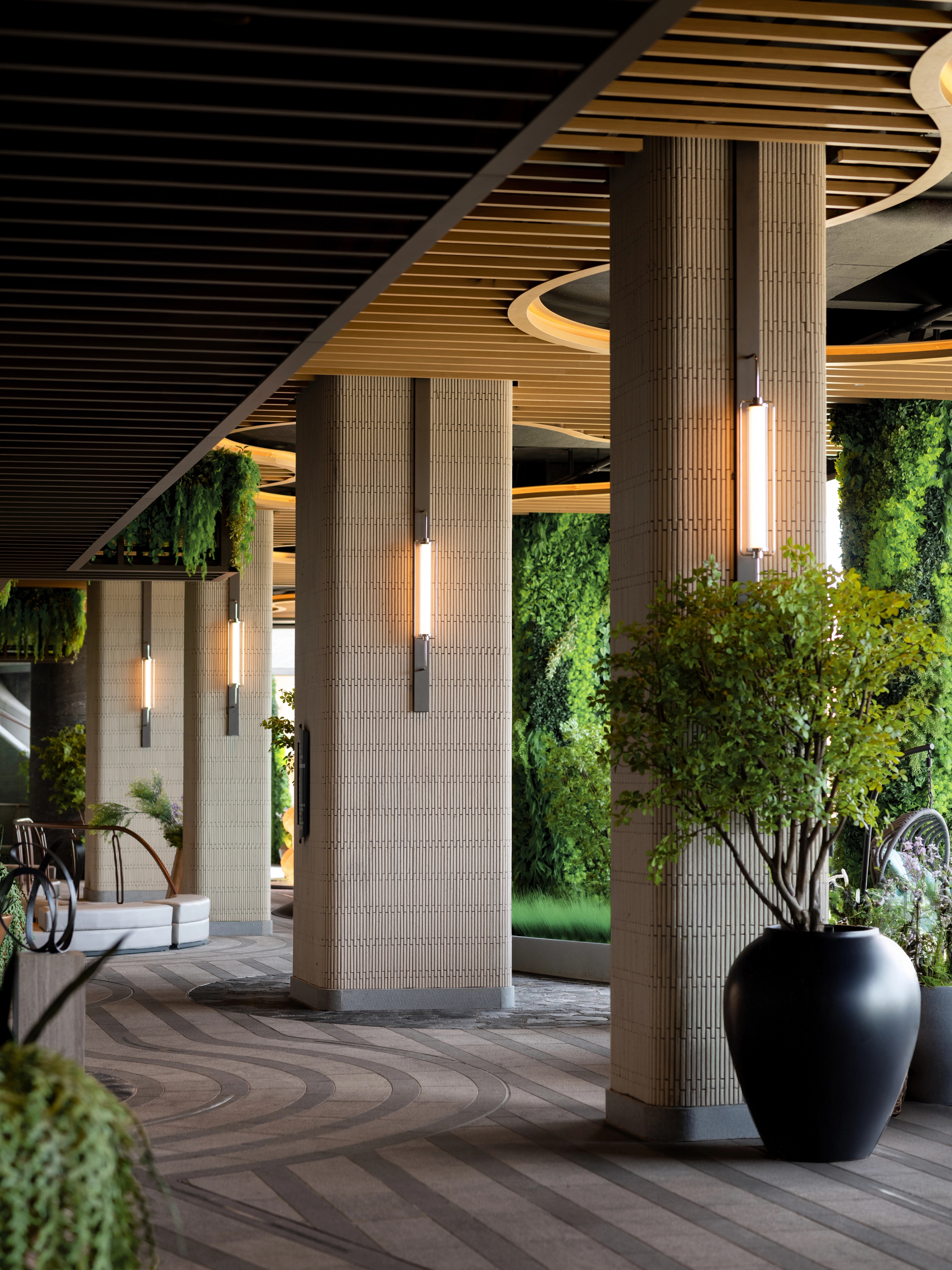 Series of columns with bespoke wall light