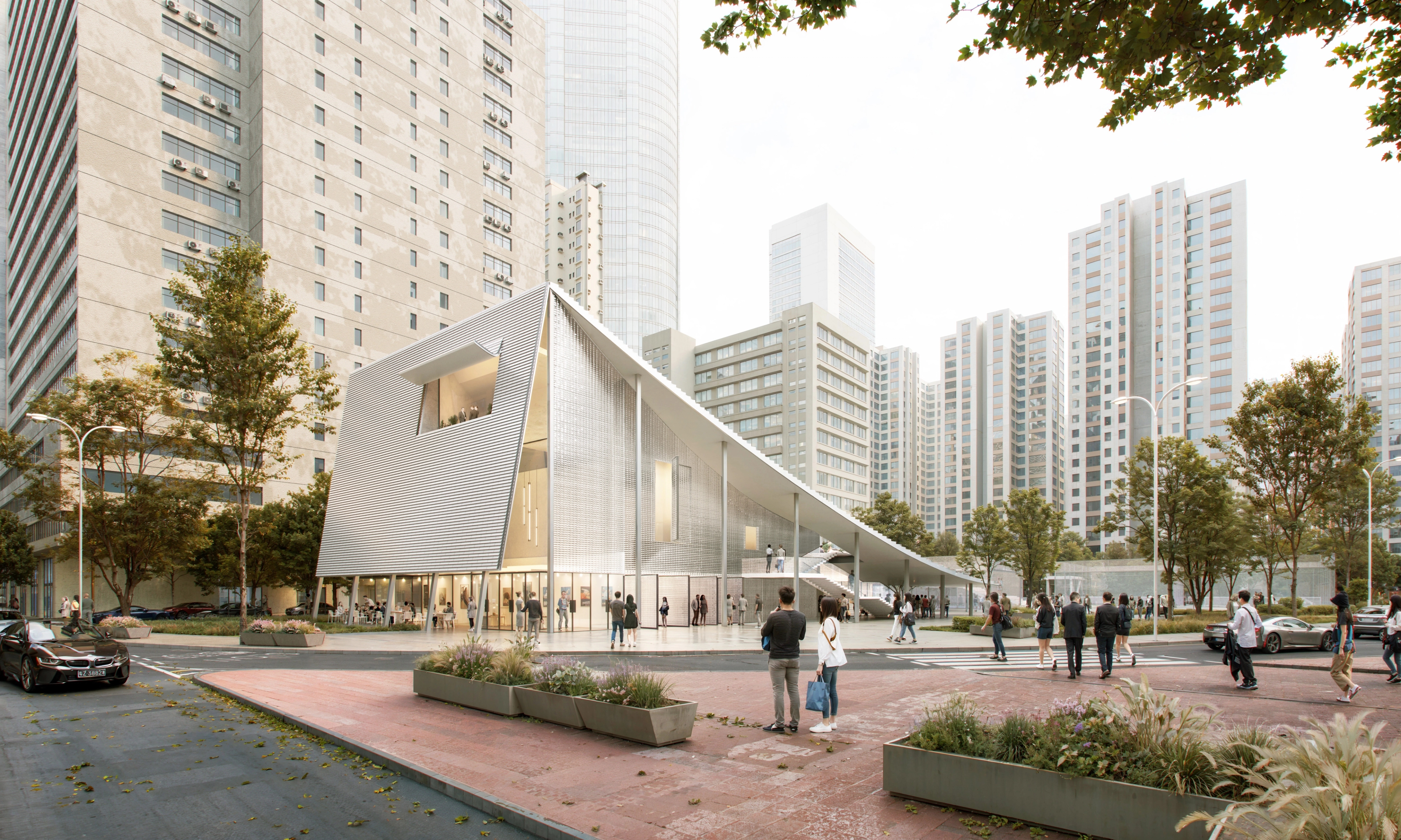 Glass pavilion in urban plaza amid high-rise apartments