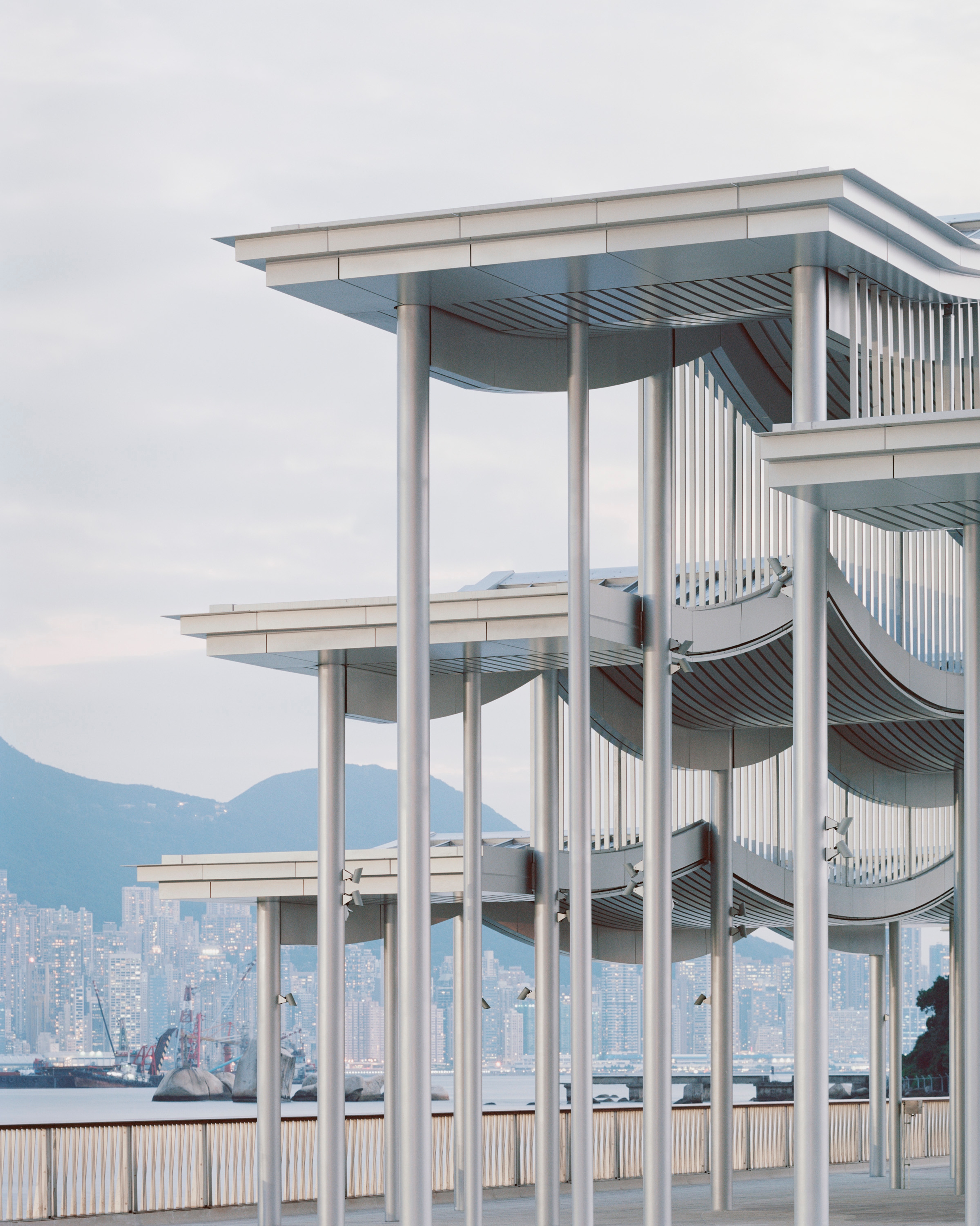 Silver pier canopy roof with stepping profile