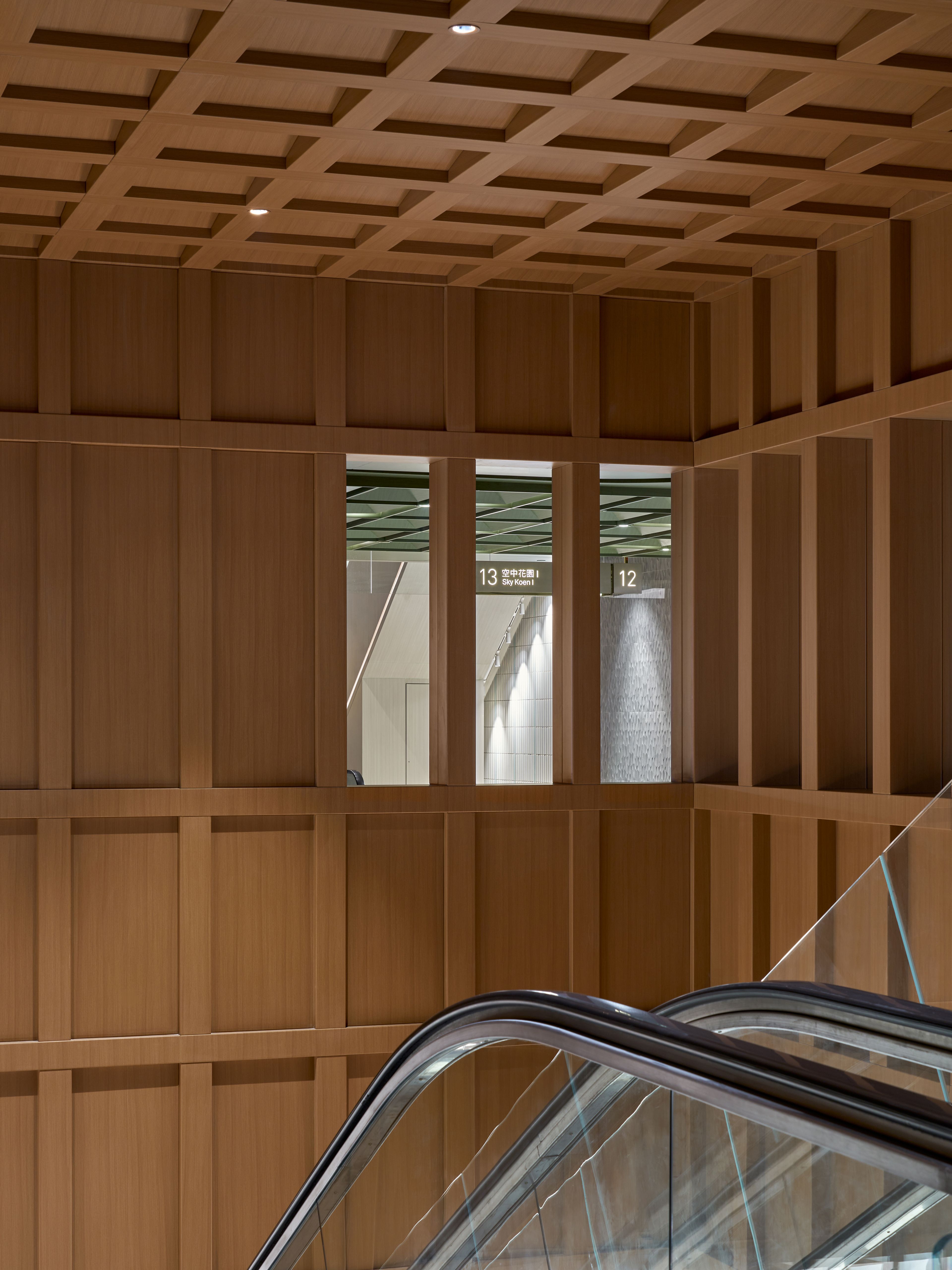 Wood atrium void with internal window opening