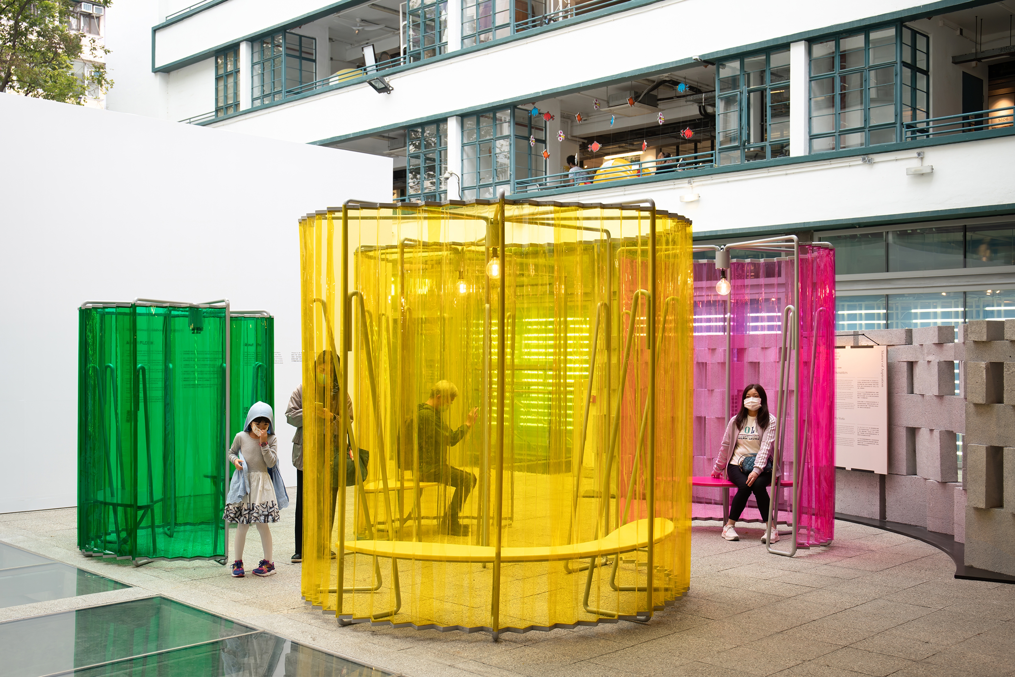 colorful installation inside building courtyard