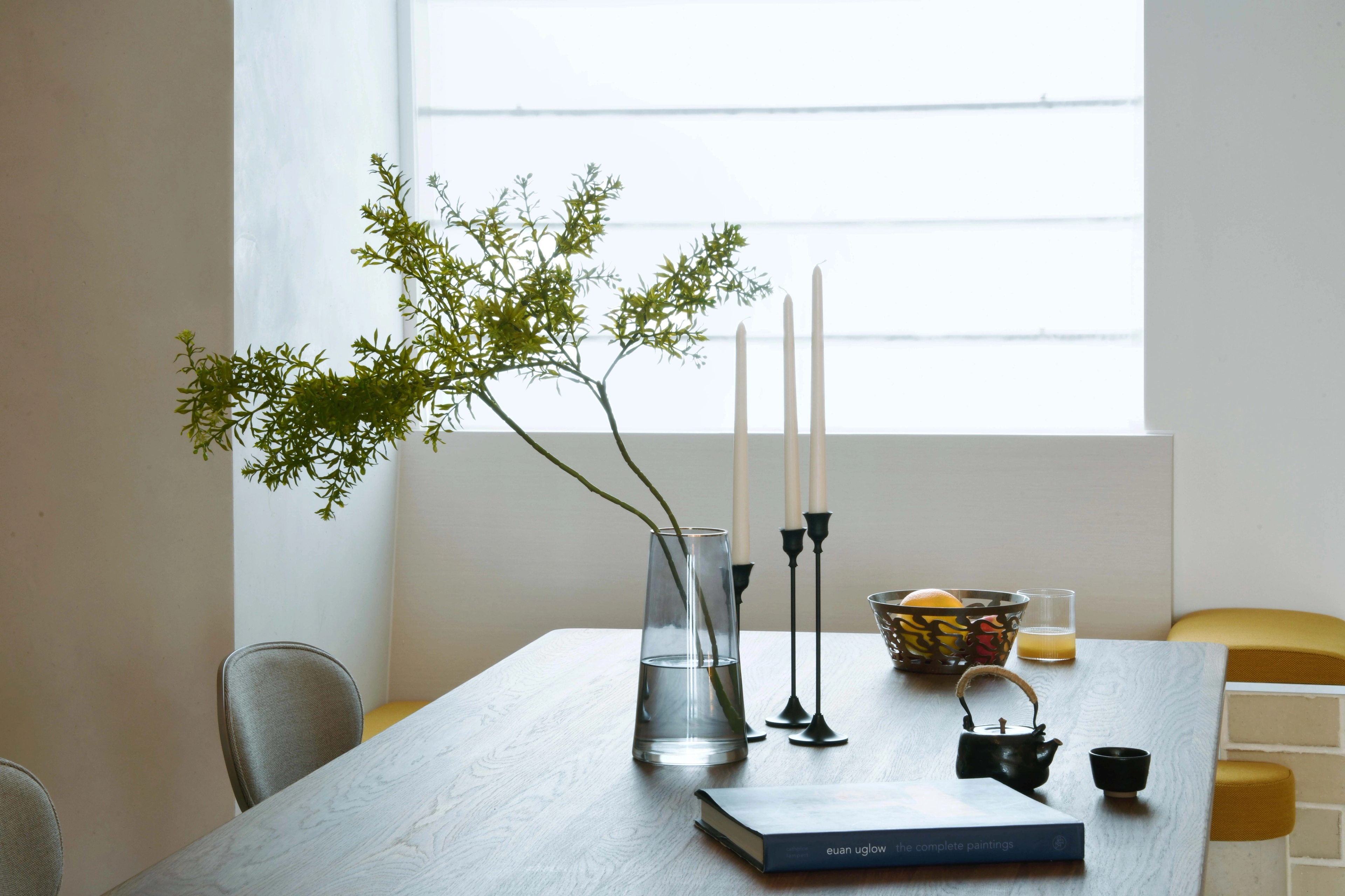 dining table with roman blind and banquette