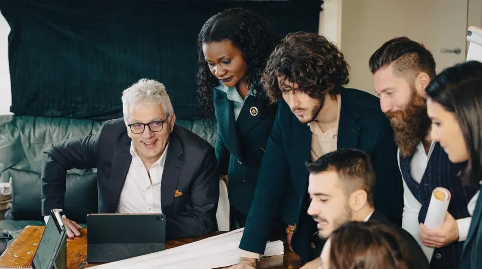 Small business owner working on laptop reviewing local SEO strategy