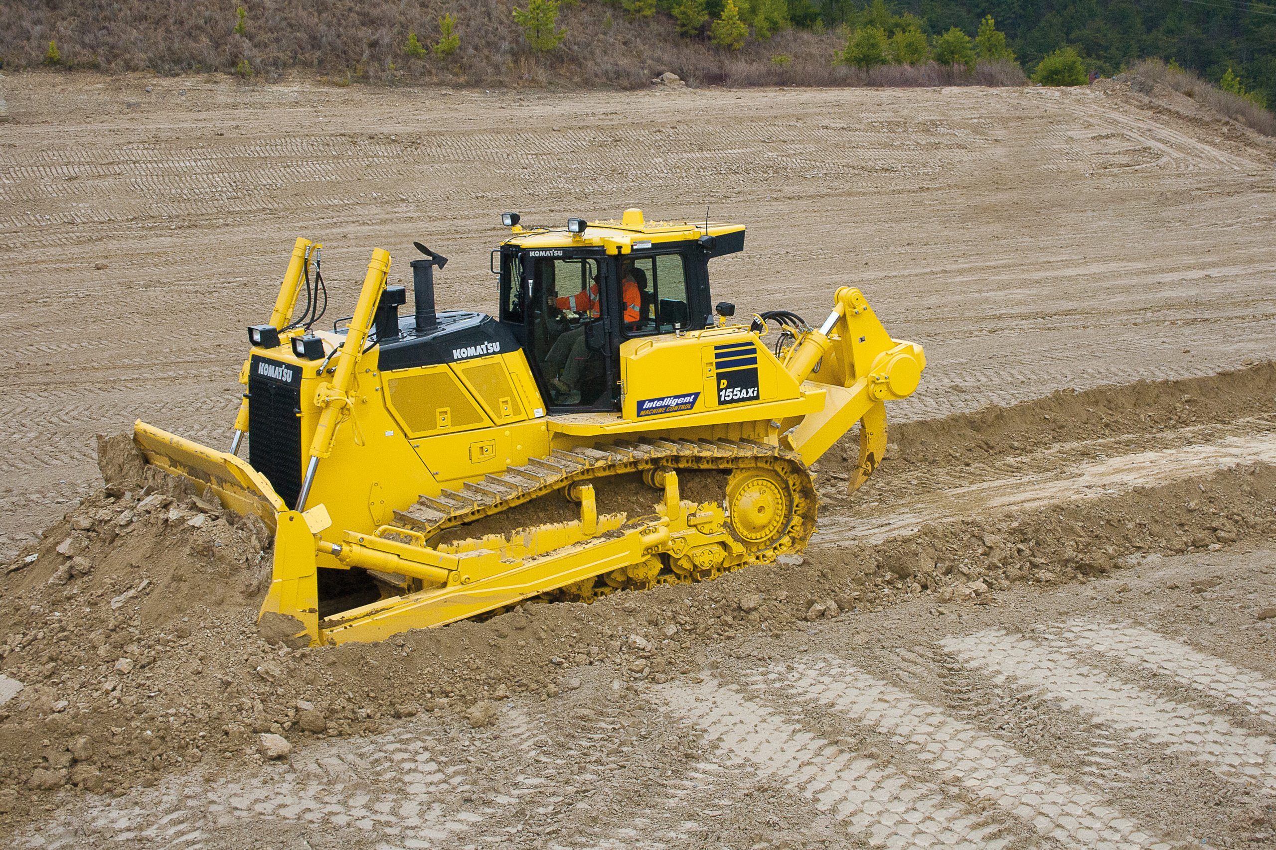 Machines / Komatsu D155AX - D275AX | Hesselberg