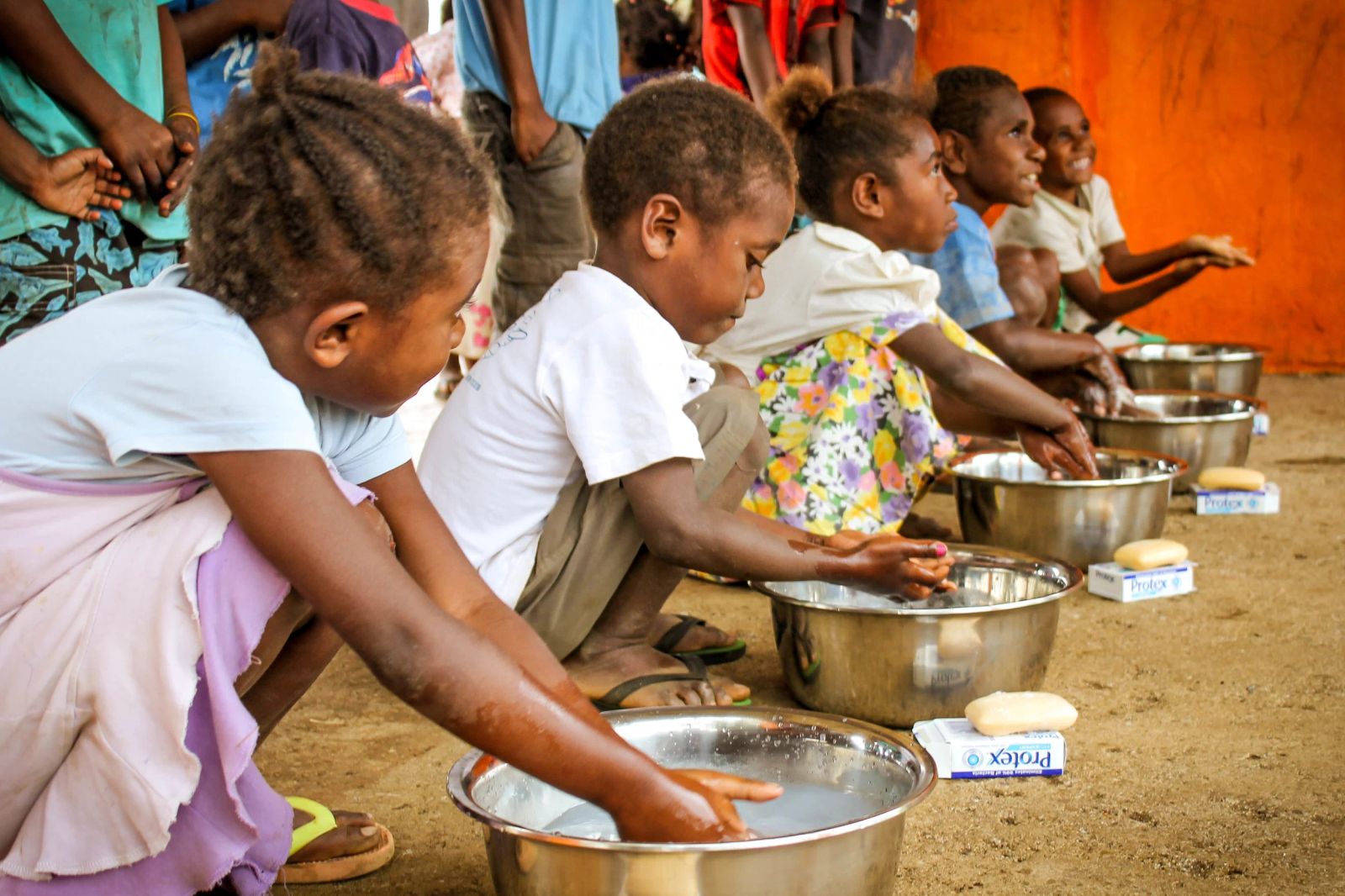 Children learning about the importance of washing their hands